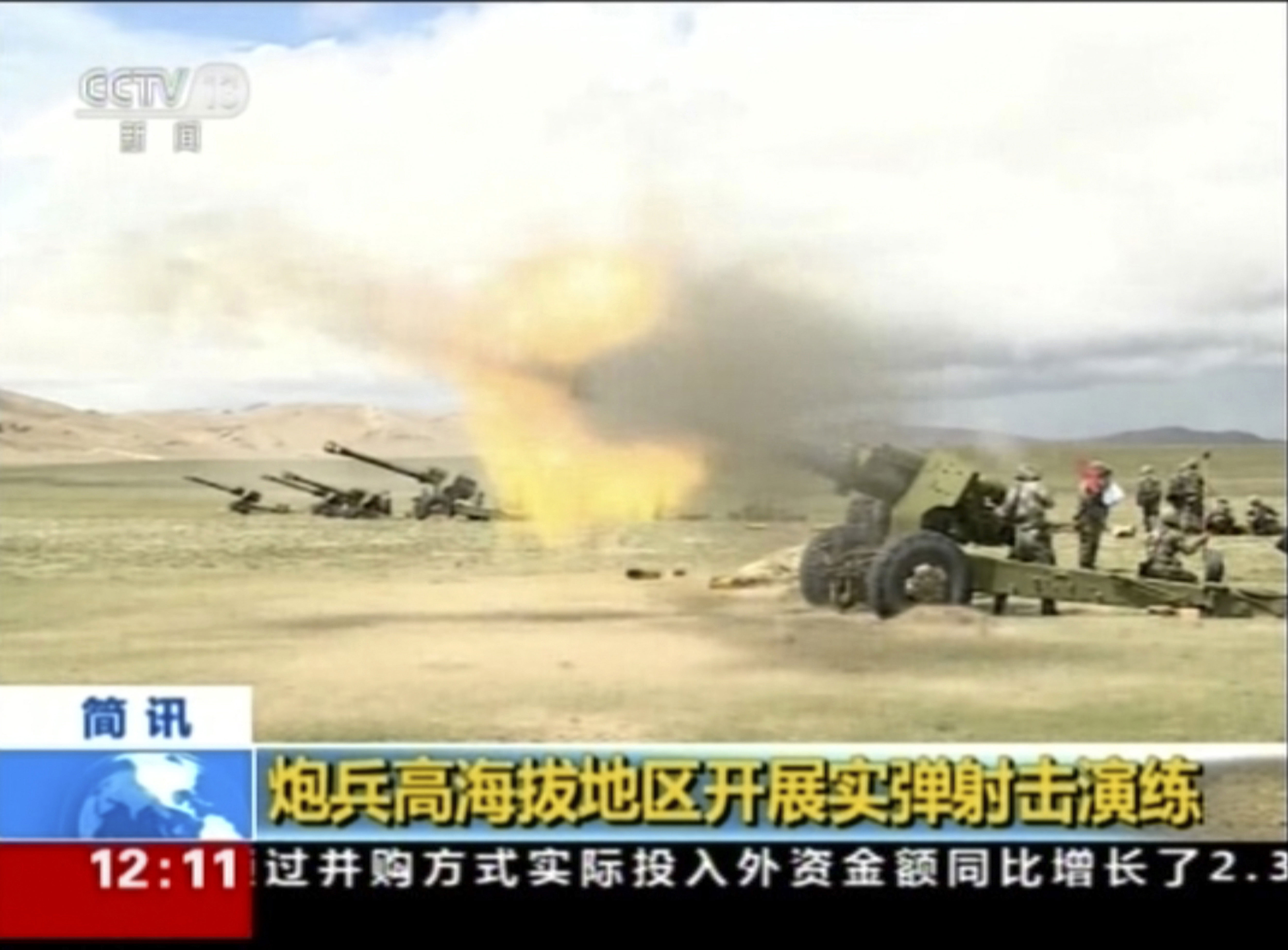 In this image taken from a recent video footage run by China's CCTV on Friday, Aug 4, 2017 via AP Video, artillery guns fire during a live-fire drill by the Chinese army in China's Tibet Autonomous Region that border India.