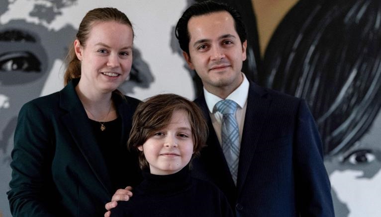 Belgian student Laurent Simons poses with his parents Lydia and Alexander Simons during a photo session at his home on November 21, 2019 in Amsterdam.