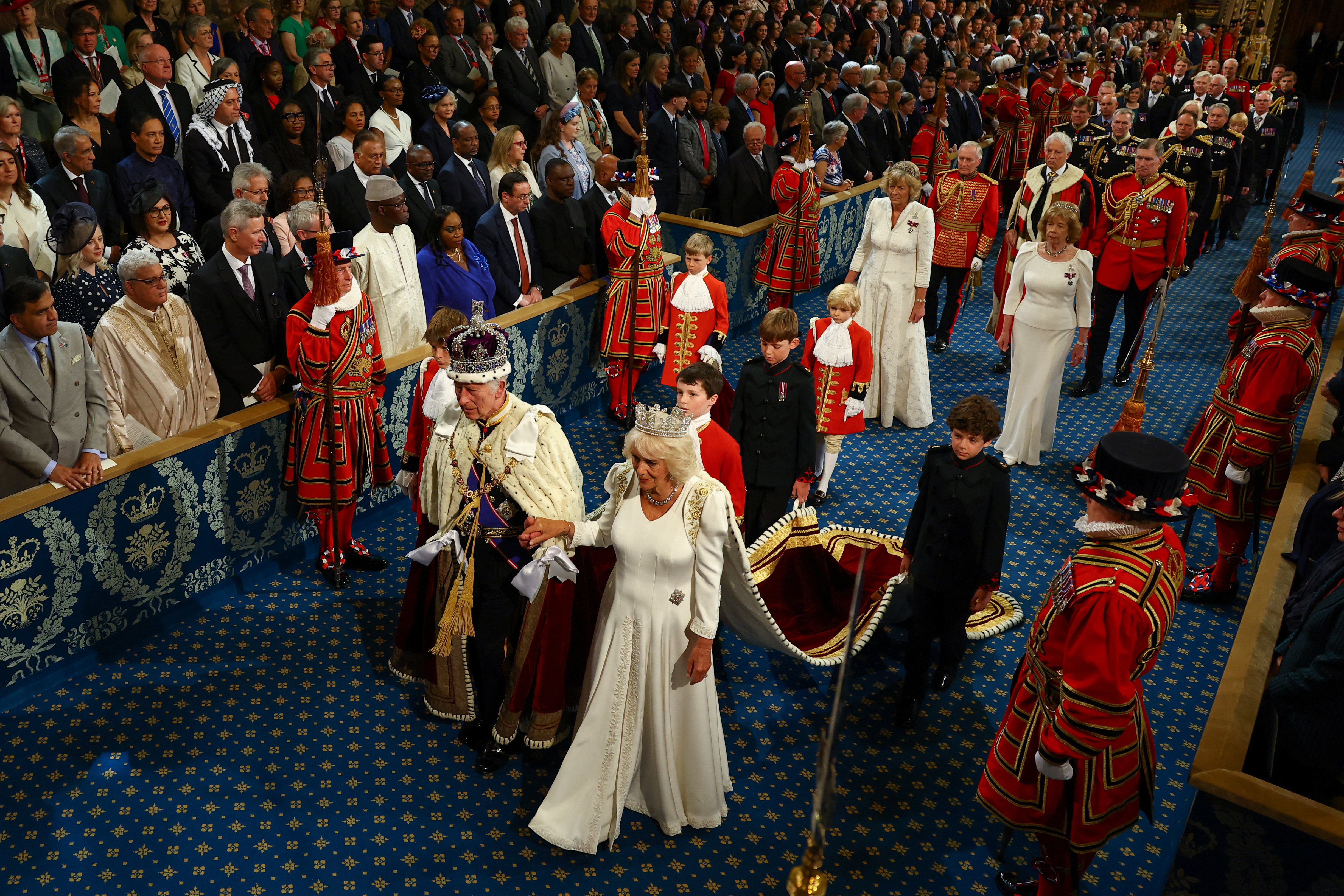 King Charles III, wearing the Imperial State Crown, and Queen Camilla, wearing the Diamond Diadem