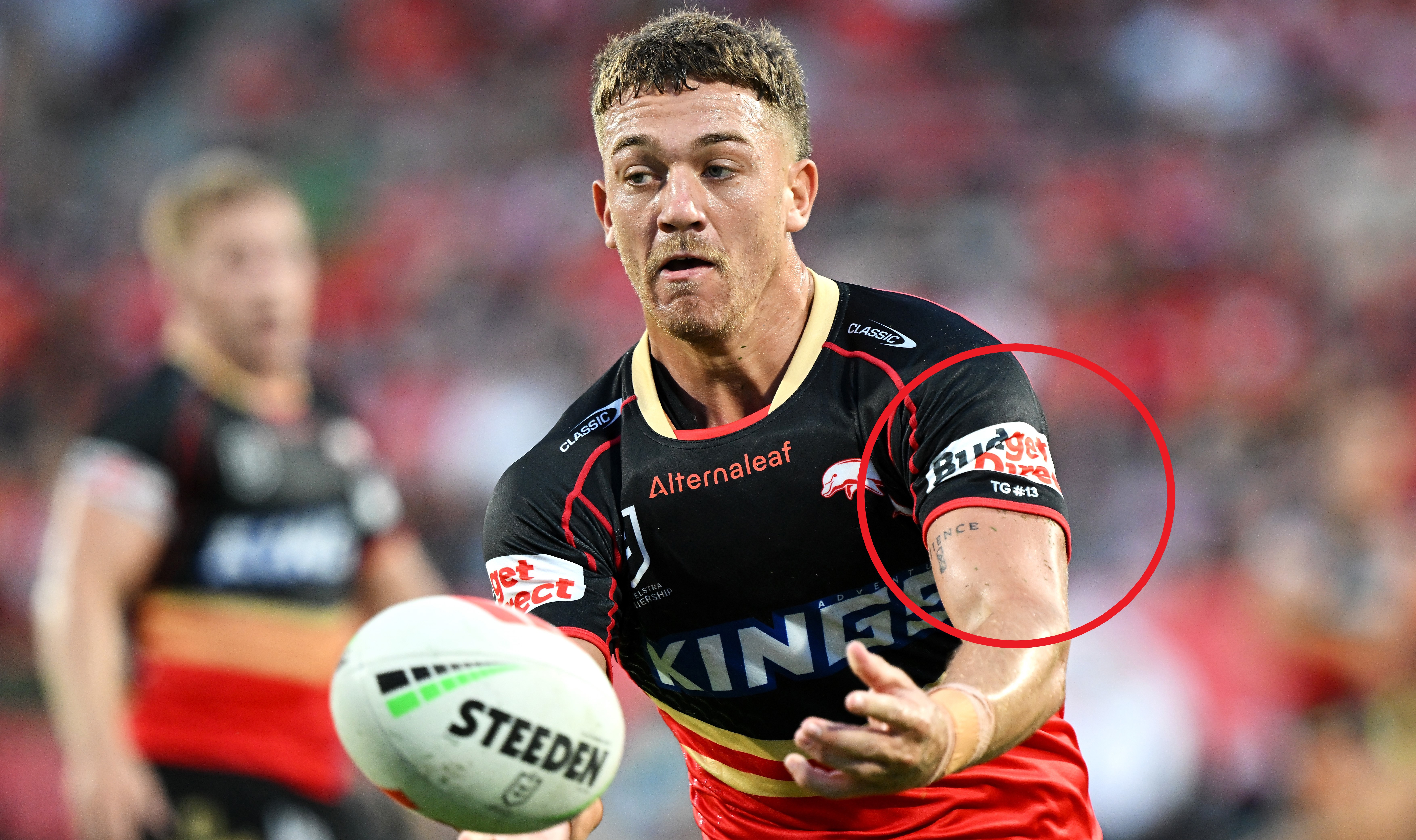 Dolphins player Kurt Donoghoe sporting the 'TG 13' tribute.