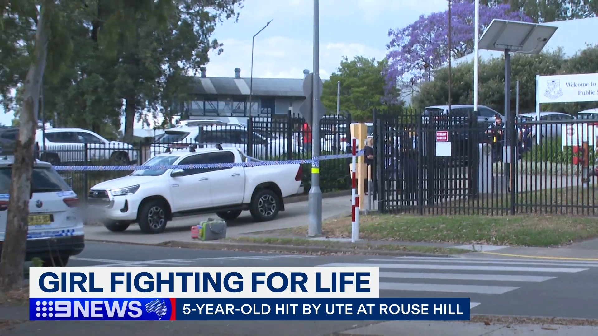 Police tape outside Rouse Hill Public School after a girl was hit by a ute while riding a scooter.