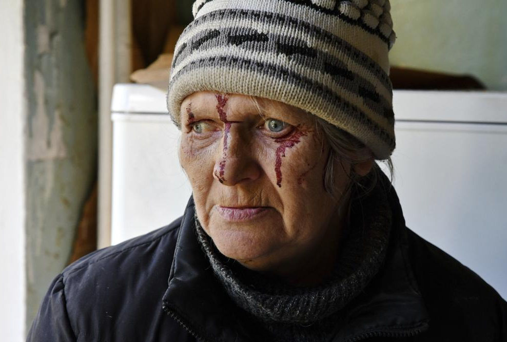 Injured Natalia Rudneva, 59, reacts as her son was hospitalised after night shelling in Kramatorsk, Ukraine,