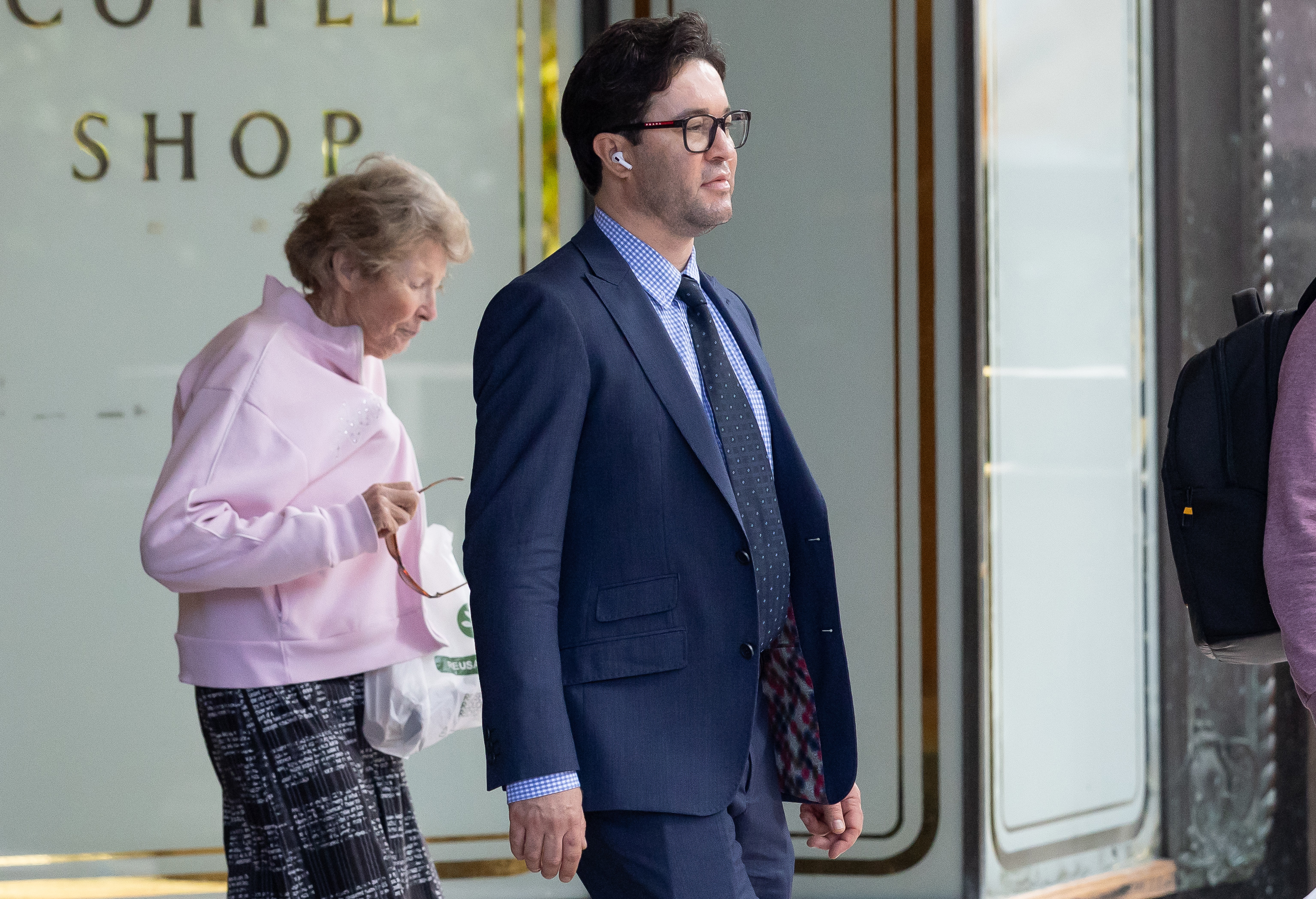 NEWS: David Charles Massa, (blue suit) accused of raping another man inside a nightclub on Oxford Street, departs Downing Centre courts.  January 2026, Photo: Wolter Peeters, The Sydney Morning Herald.