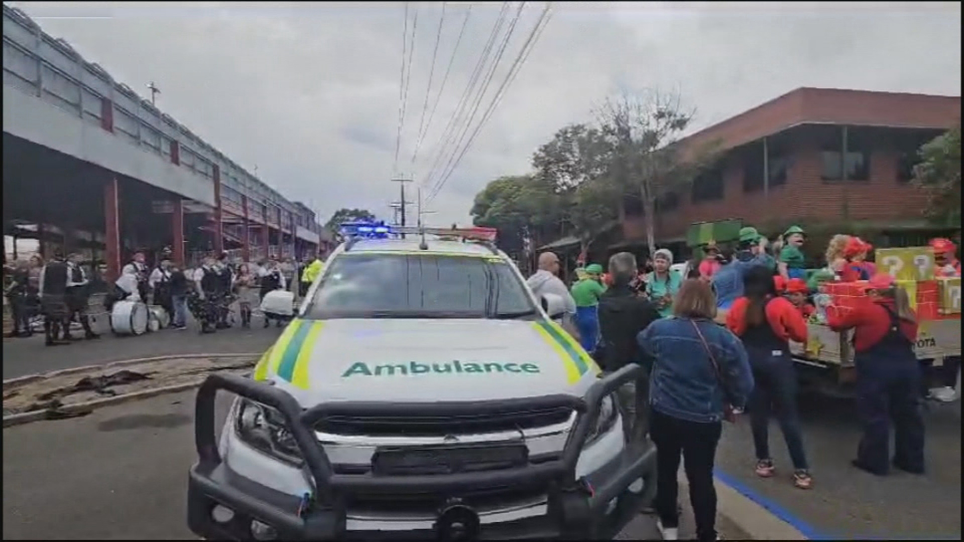 An out-of-control car has caused a major scare at the Port Adelaide Christmas Pageant.Participants had to be treated for shock after the sedan ploughed through a barrier, missing them by metres.