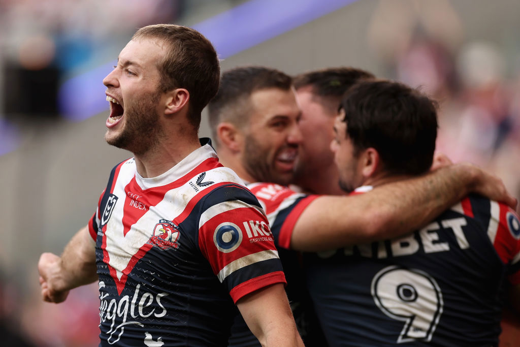 Sam Walker celebrates a try by team mates Victor Radley.