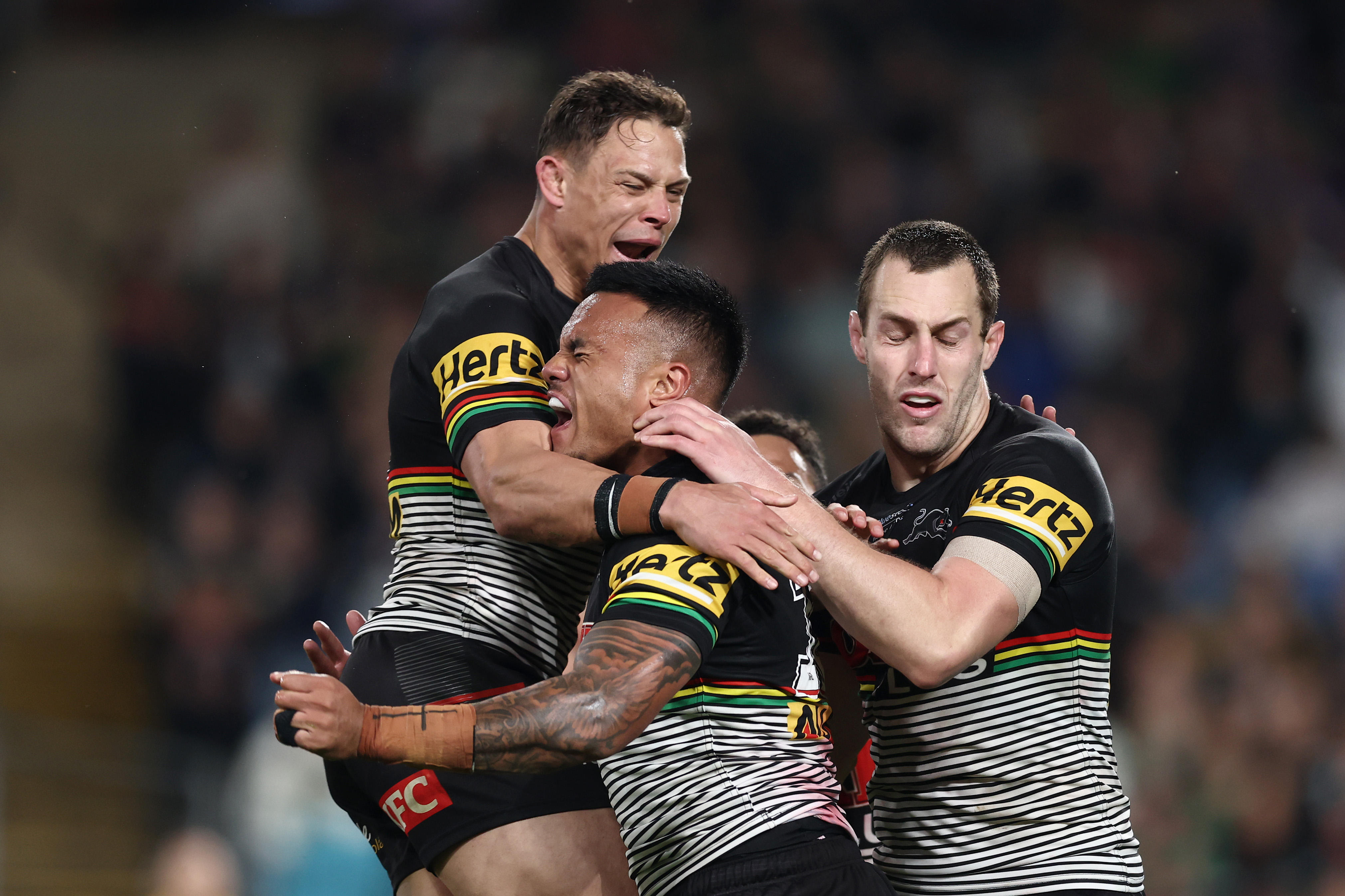 Penrith Panthers celebrate a Spencer Leniu try in their win over South Sydney.