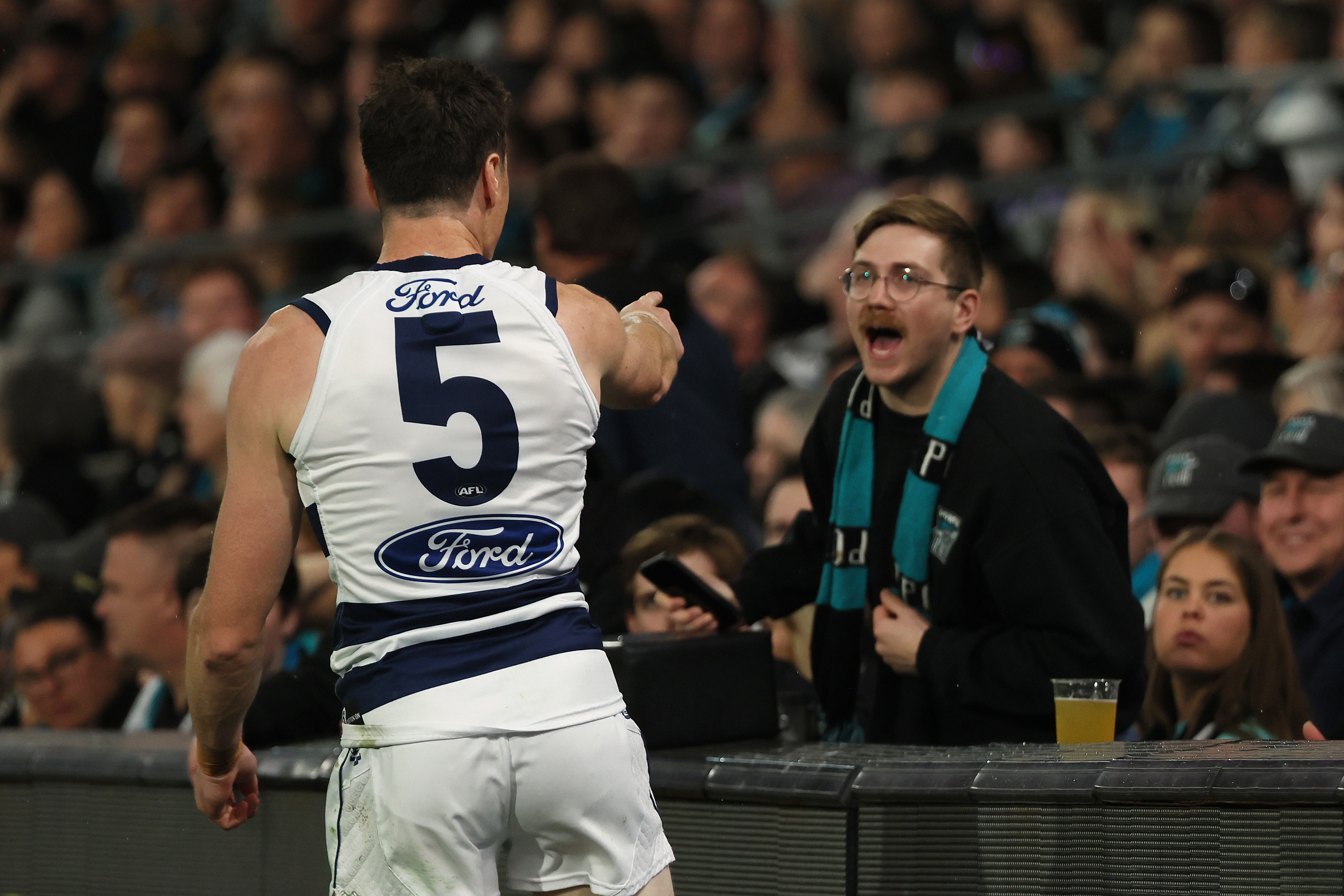 Jeremy Cameron comes face-to-face with a Port fan.