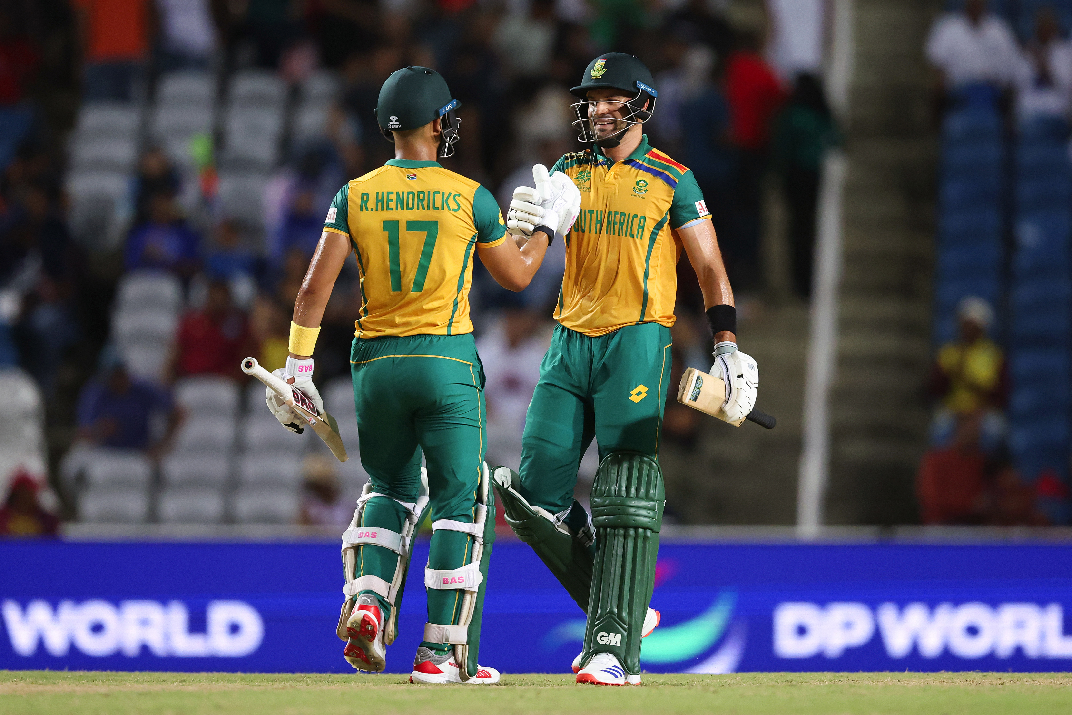 Aiden Markram and Reeza Hendricks of South Africa celebrate victory in the ICC Men's T20 Cricket World Cup West Indies & USA 2024 Semi-Final match between South Africa and Afghanistan at Brian Lara Cricket Academy on June 26, 2024 in Tarouba, Trinidad And Tobago. (Photo by Robert Cianflone/Getty Images)