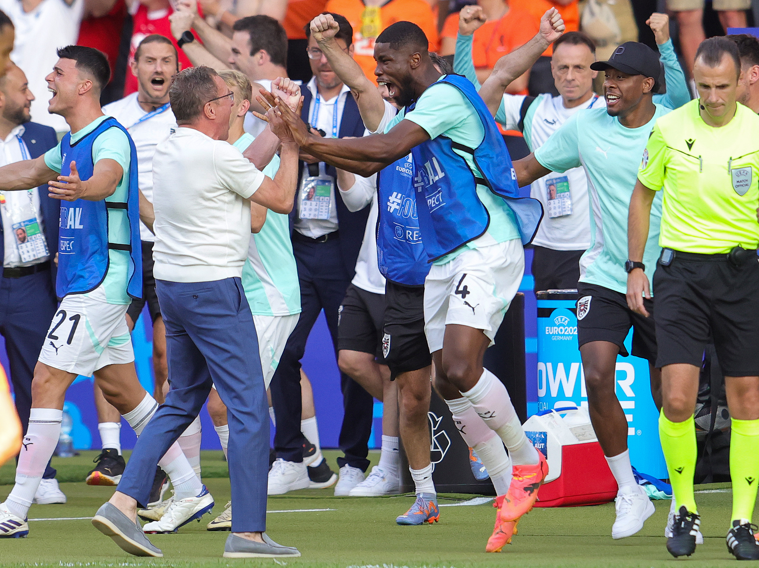 Head coach Ralf Rangnick of Austria and Kevin Danso celebrate a Euros victory.