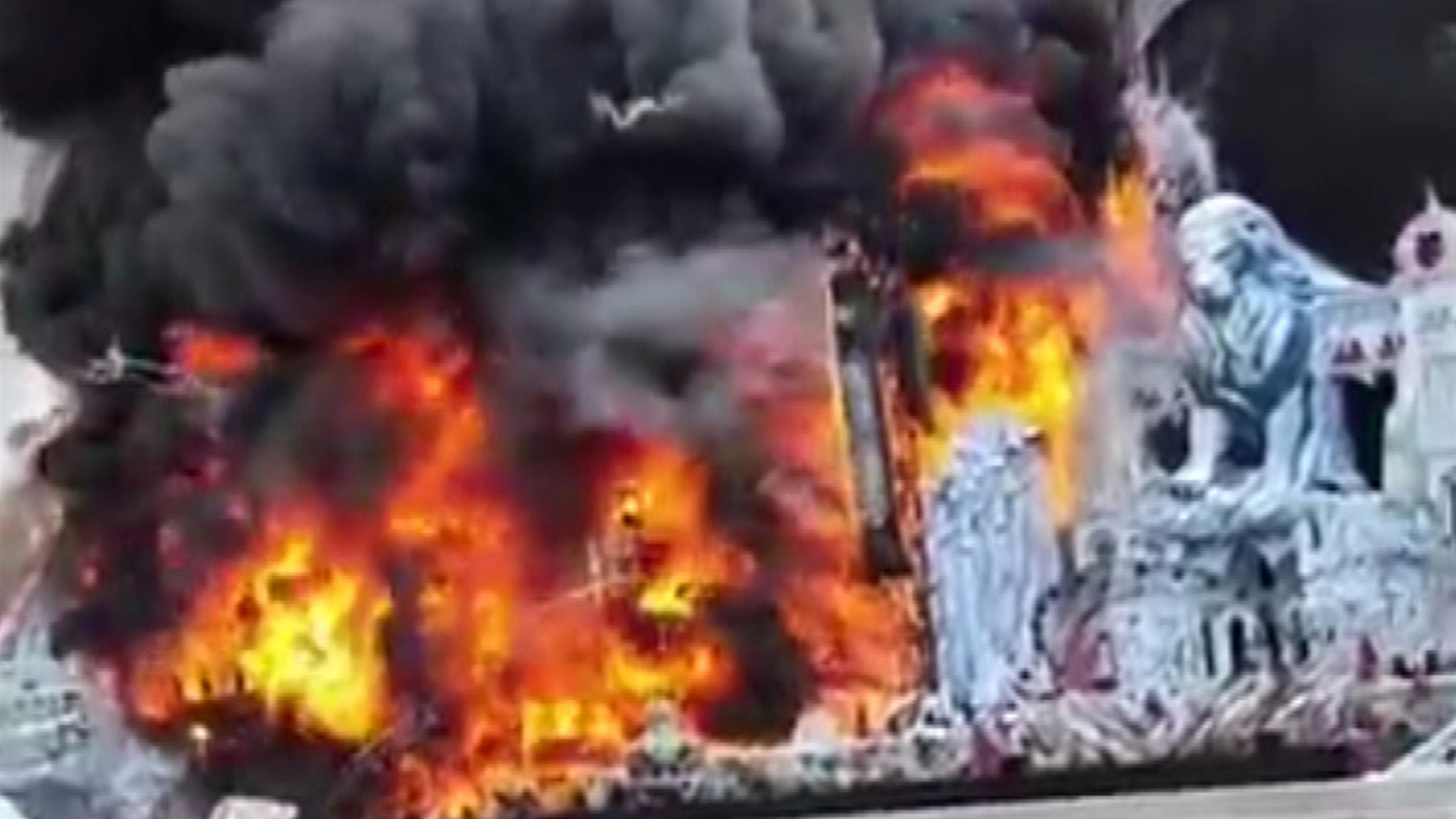 Images shared on local news sites and social media showed flames and plumes of black smoke engulfing the stage and spreading to nearby woodland.