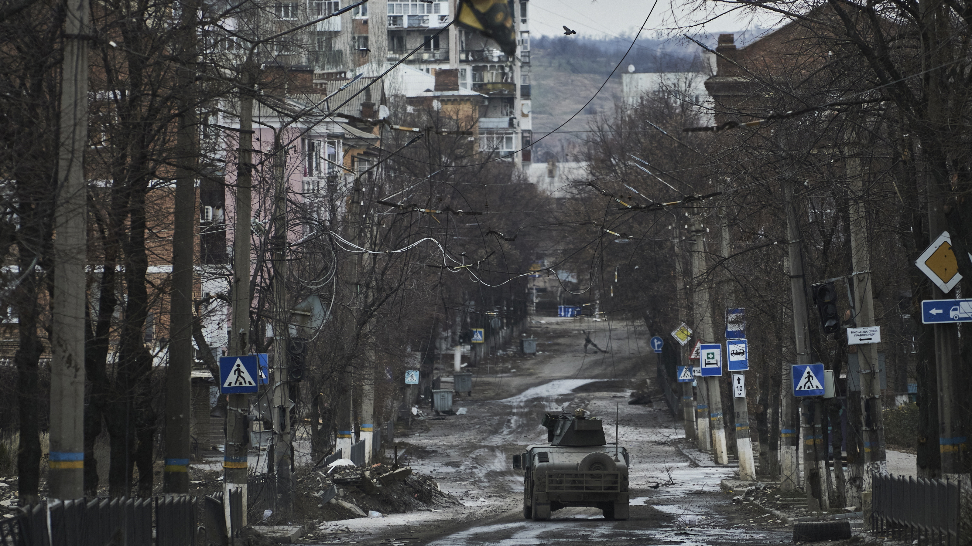Ukrainian soldiers ride in a Humvee in Bakhmut, Donetsk region, Ukraine.