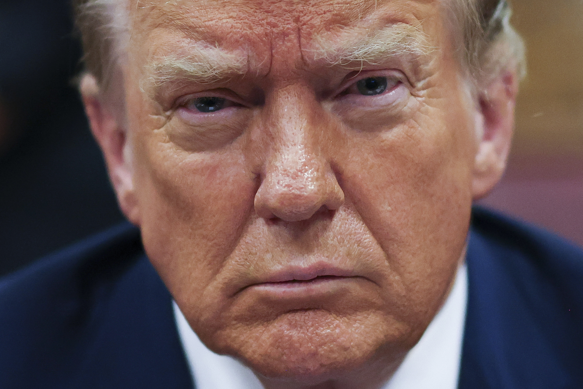 Former US President Donald Trump awaits the start of proceedings during jury selection at Manhattan criminal court, Thursday, April 18, 2024 in New York.