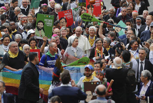 Pope Francis walks in procession on the occasion of the Amazon synod, a three-week meeting on preserving the rainforest and ministering to its native people, at the Vatican, Monday, Oct. 7, 2019.