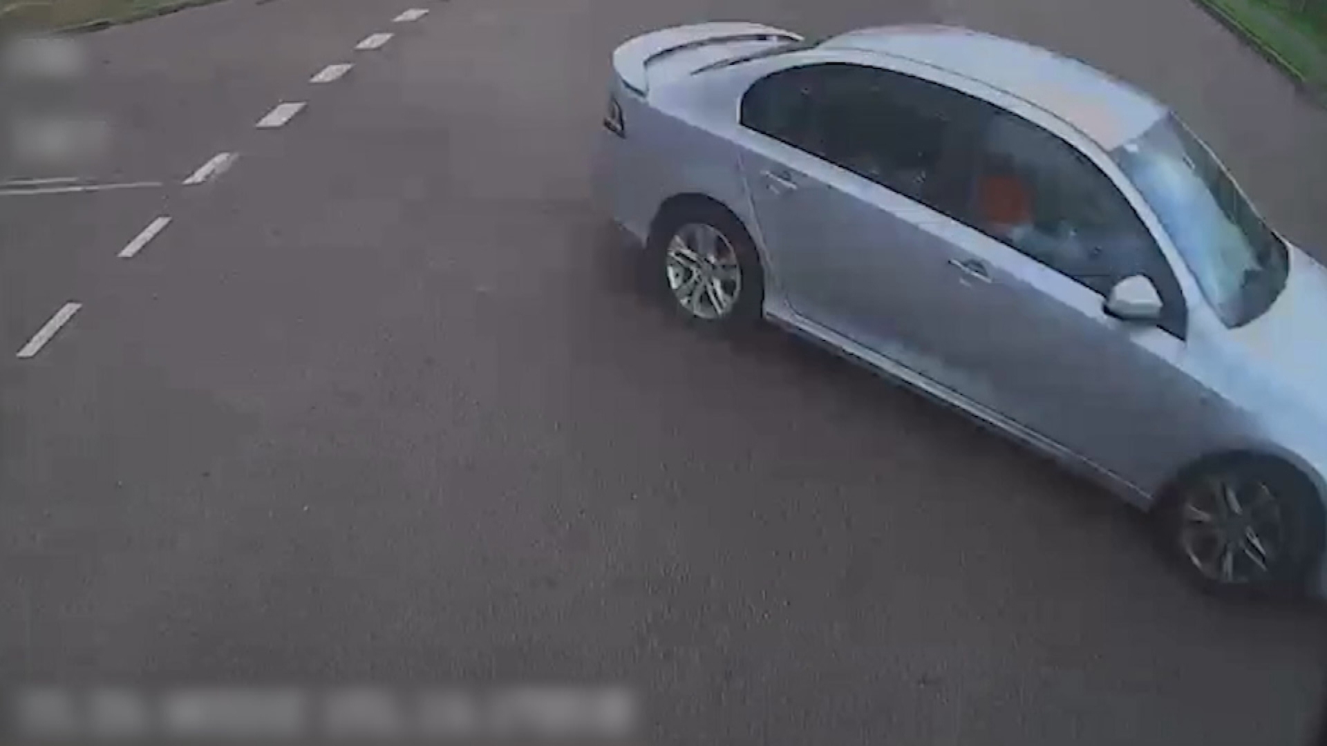 A car pulling out in front of an oncoming vehicle captured on a dashcam. 