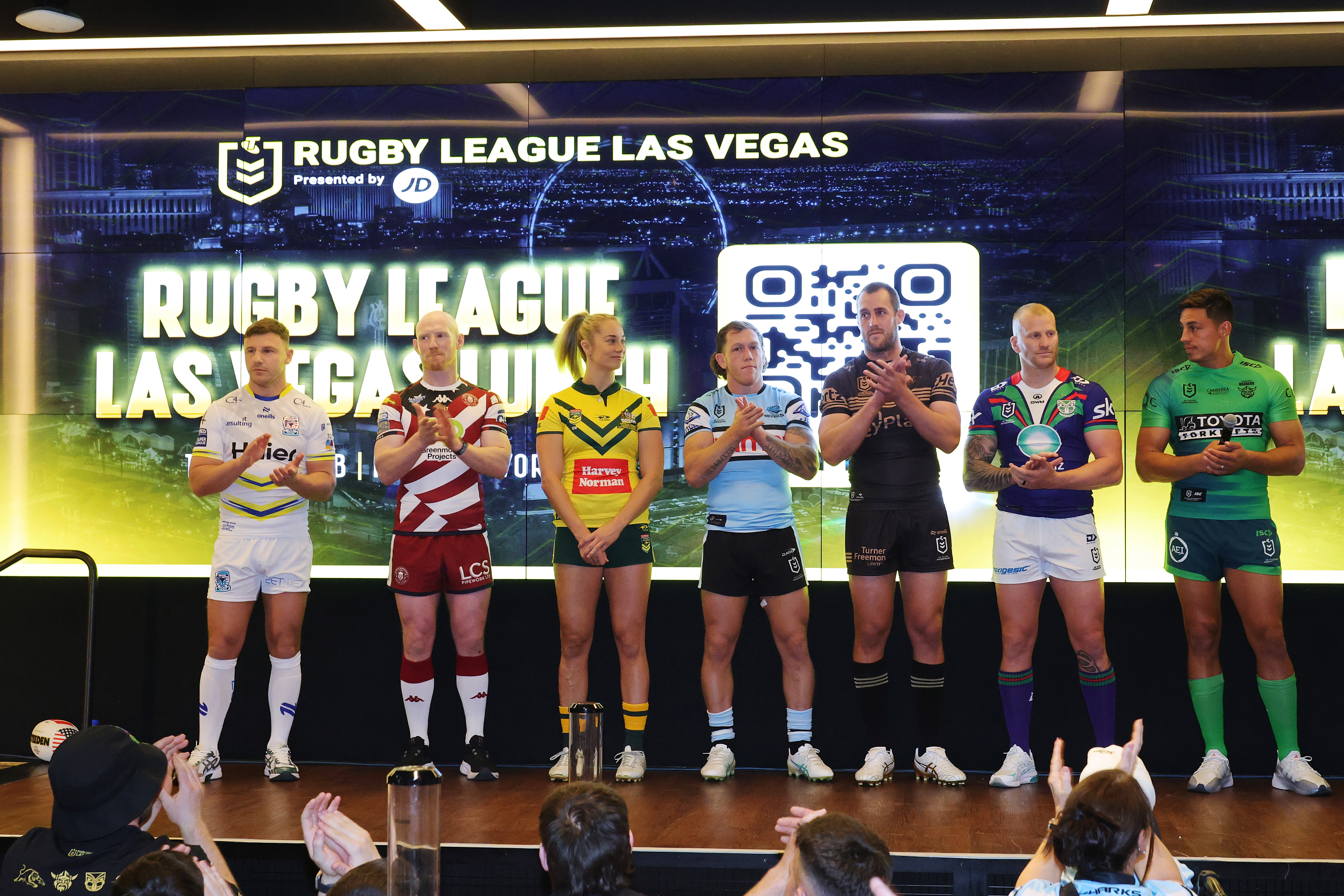 George Williams of the Warrington Wolves, Liam Farrell of the Wigan Warriors, Kezie Apps of the Australian Jillaroos, Cameron McInnes of the Cronulla Sharks, Isaah Yeo of the Penrith Panthers, Mitchell Barnett of the Warriors and Joseph Tapine of the Canberra Raiders represent their clubs at the NRL Las Vegas media launch.