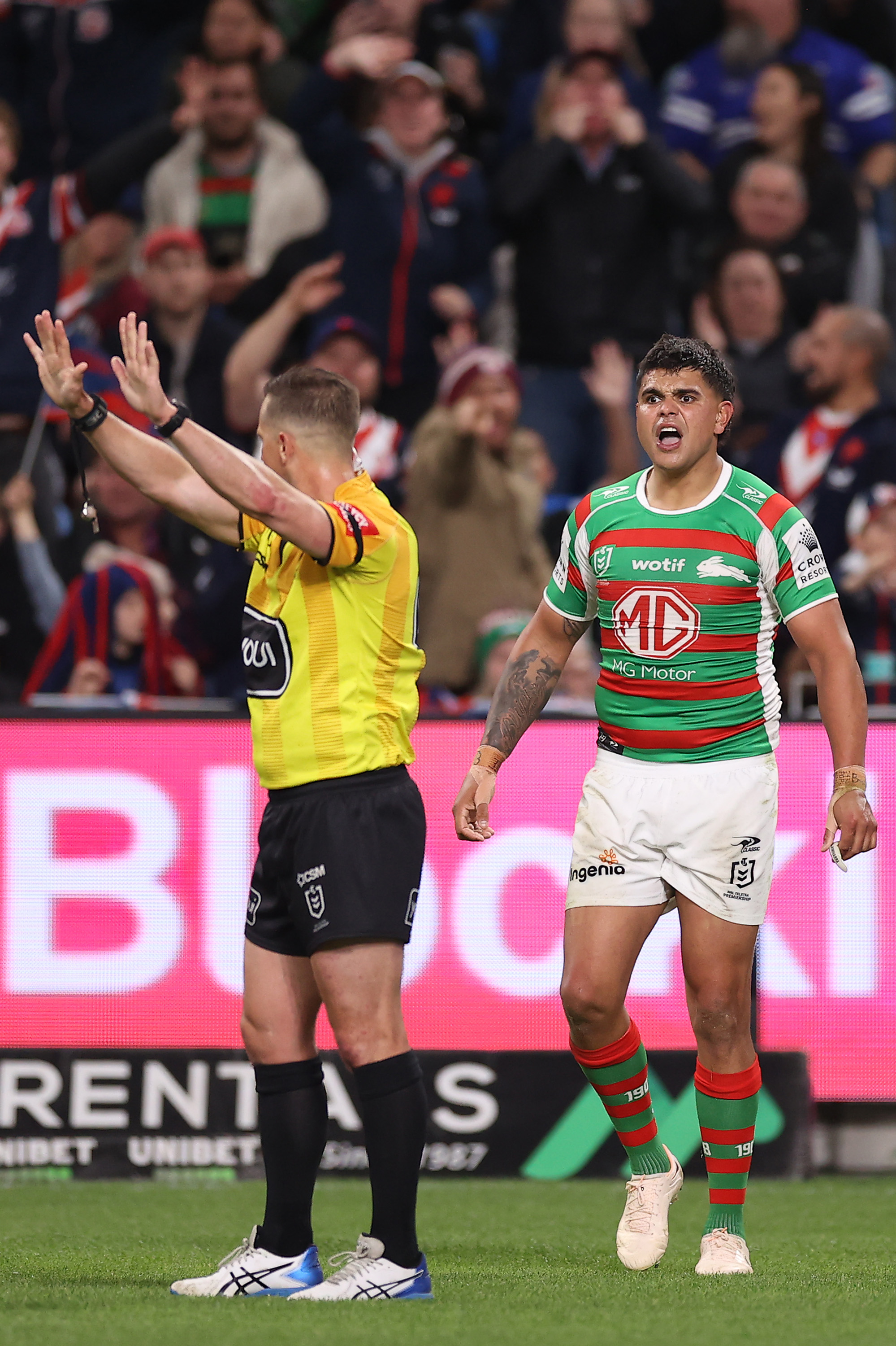 Latrell Mitchell of the Rabbitohs is sent to the sin-bin by referee Grant Atkins during the round 25 clash with the Roosters.