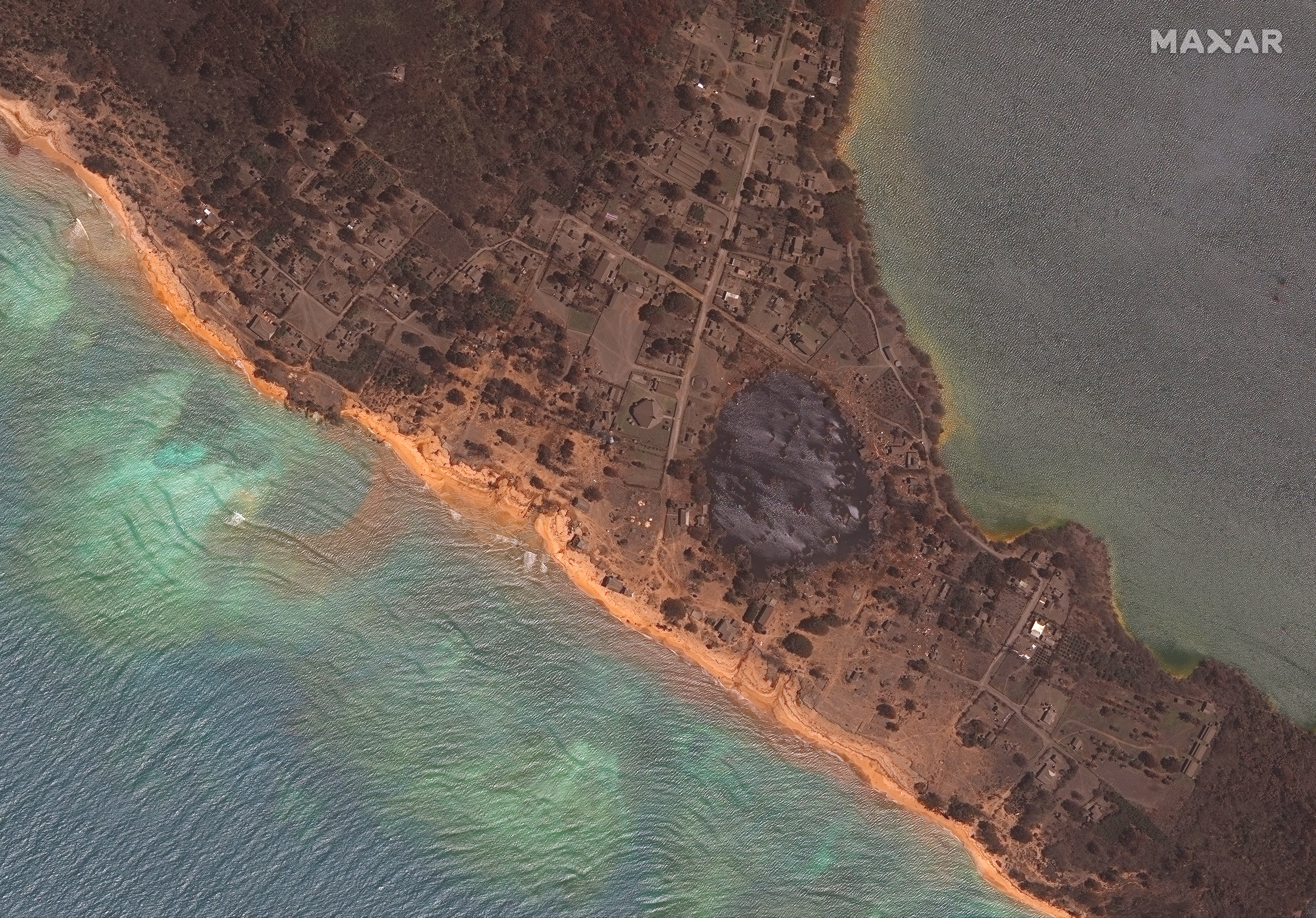 This satellite image provided by Maxar Technologies shows an overview of the damage on Nomuka in the Tonga island group on January 20 after the natural disaster. 