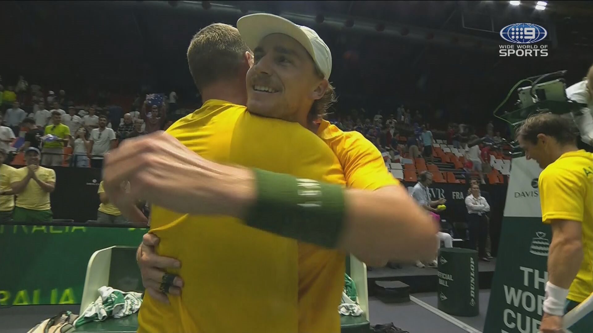 Max Purcell celebrates with team captain Lleyton Hewitt.