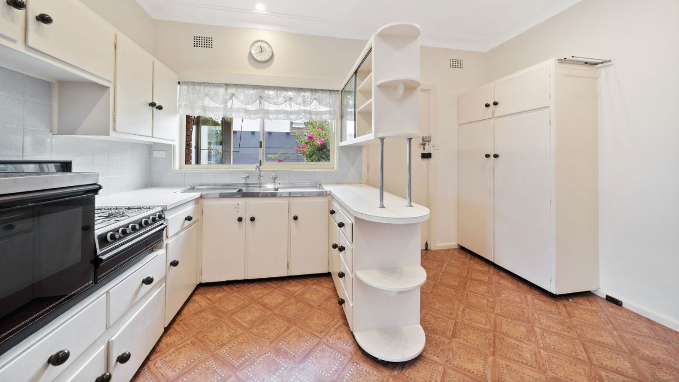 Waterfront house auction Sydney kitchen retro Domain