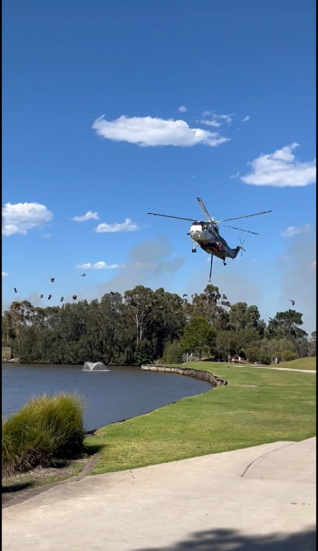Locals in a suburb south of Sydney are being told it is too late to leave as a bushfire approaches.