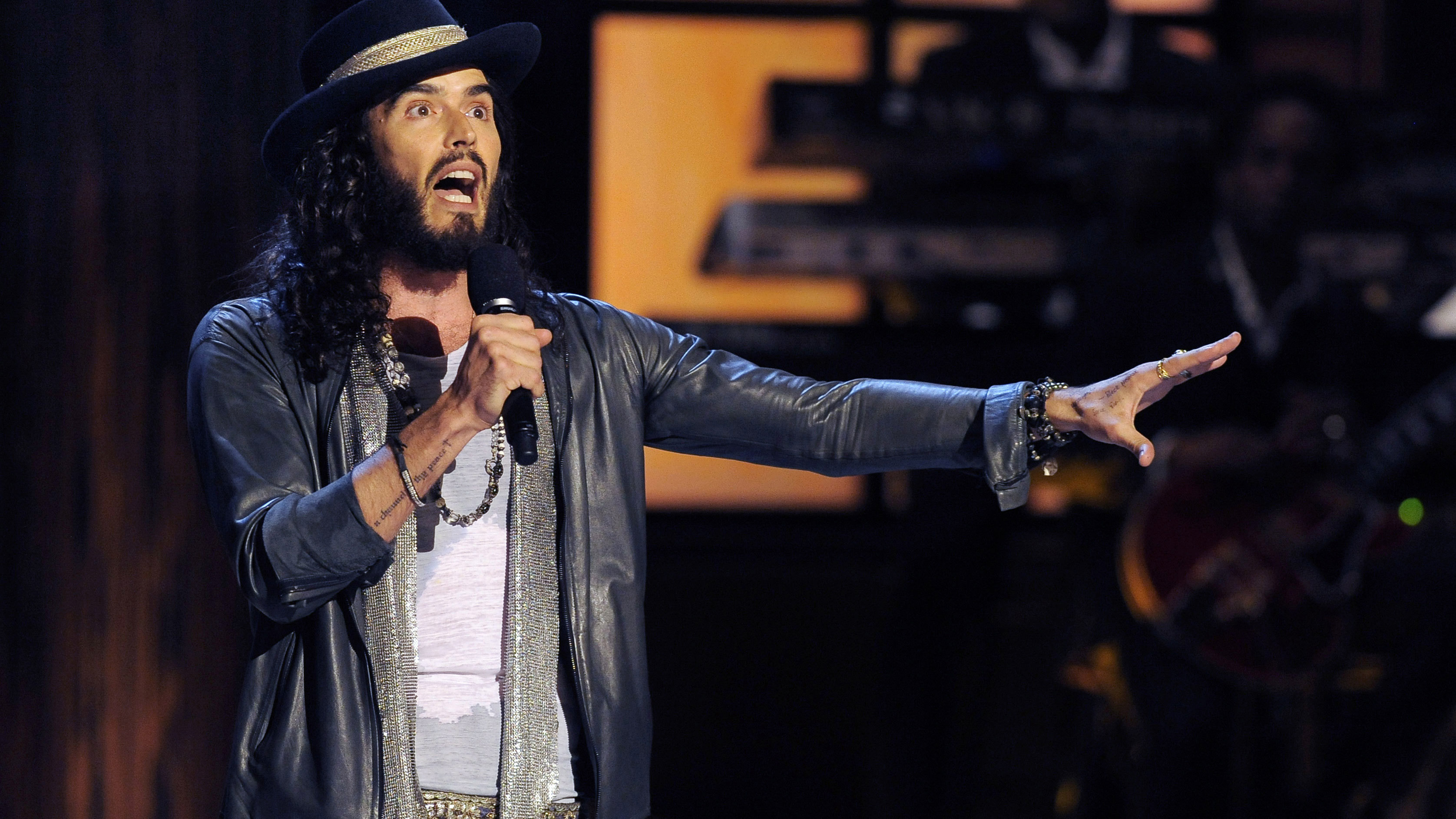 Comedian Russell Brand on stage in 2012. Three British news organisations are on Saturday, September 16, 2023 reporting that comedian and social influencer Russell Brand has been accused of rape, sexual assault and abuse.