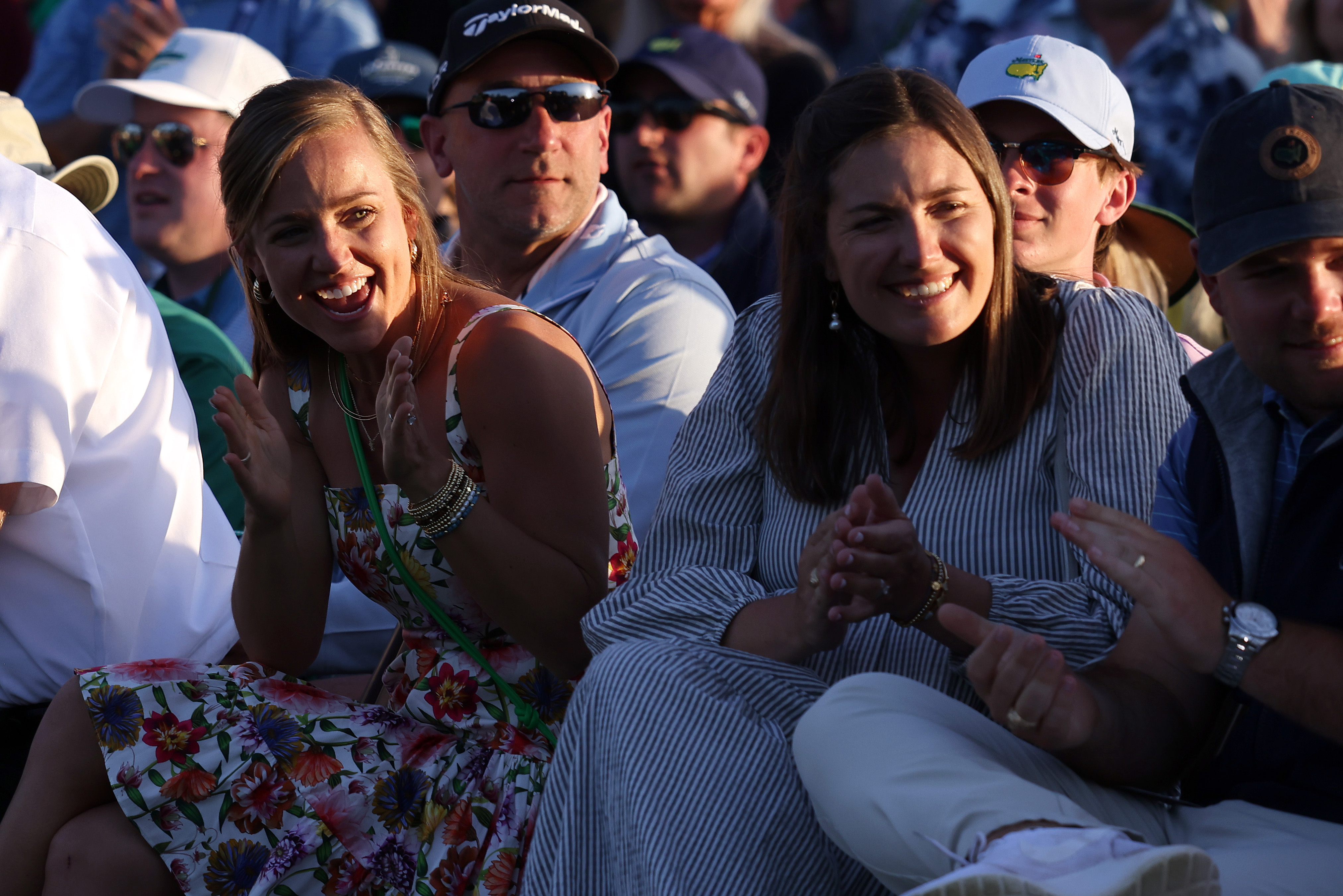 Meredith Scheffler (L), wife of Scottie Scheffler, celebrates during the Green Jacket Ceremony.