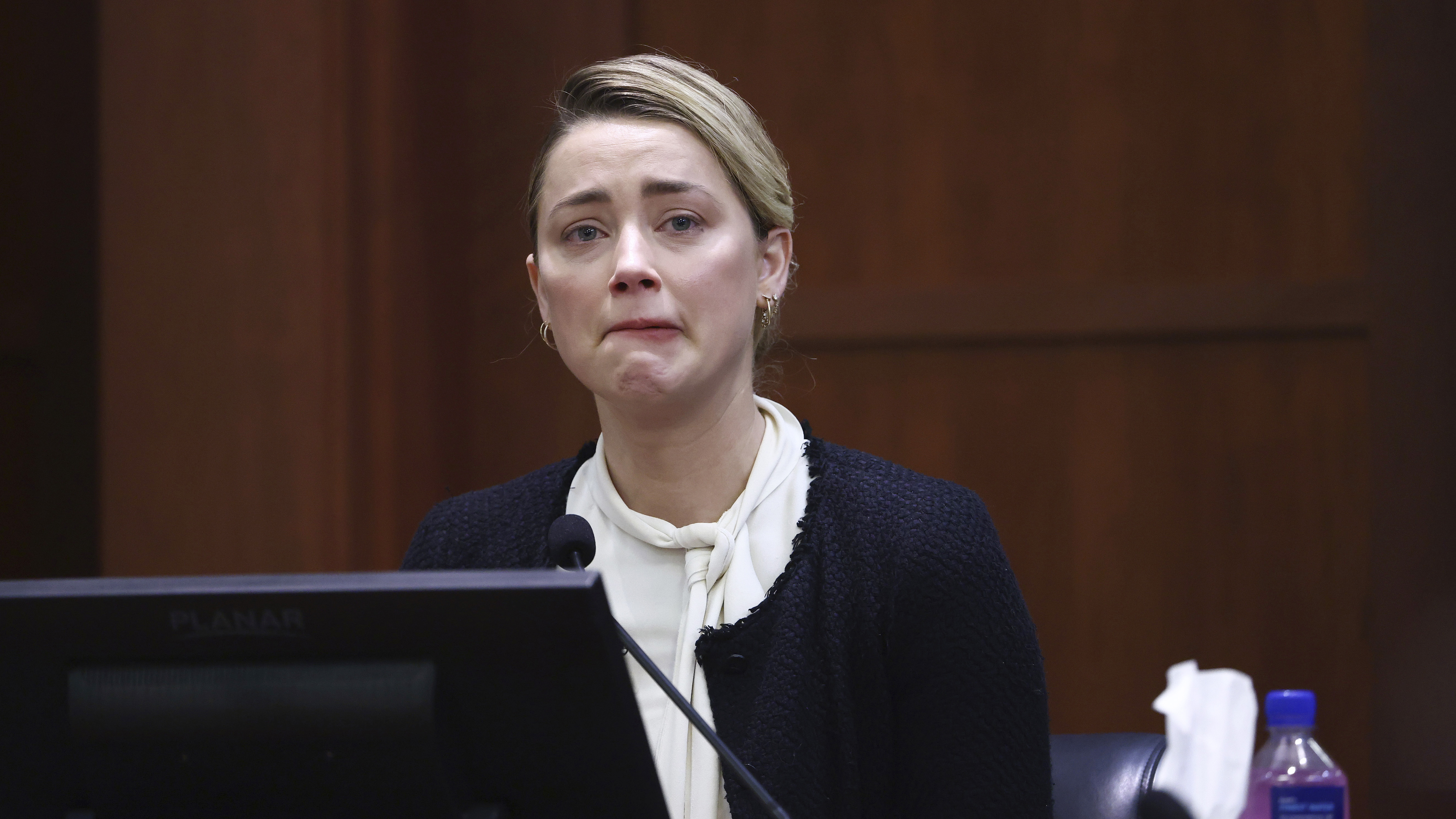 US actress Amber Heard reacts on the stand during the 50 million US dollar Depp vs Heard defamation trial at the Fairfax County Circuit Court in Fairfax, Virginia, USA, 05 May 2022. 