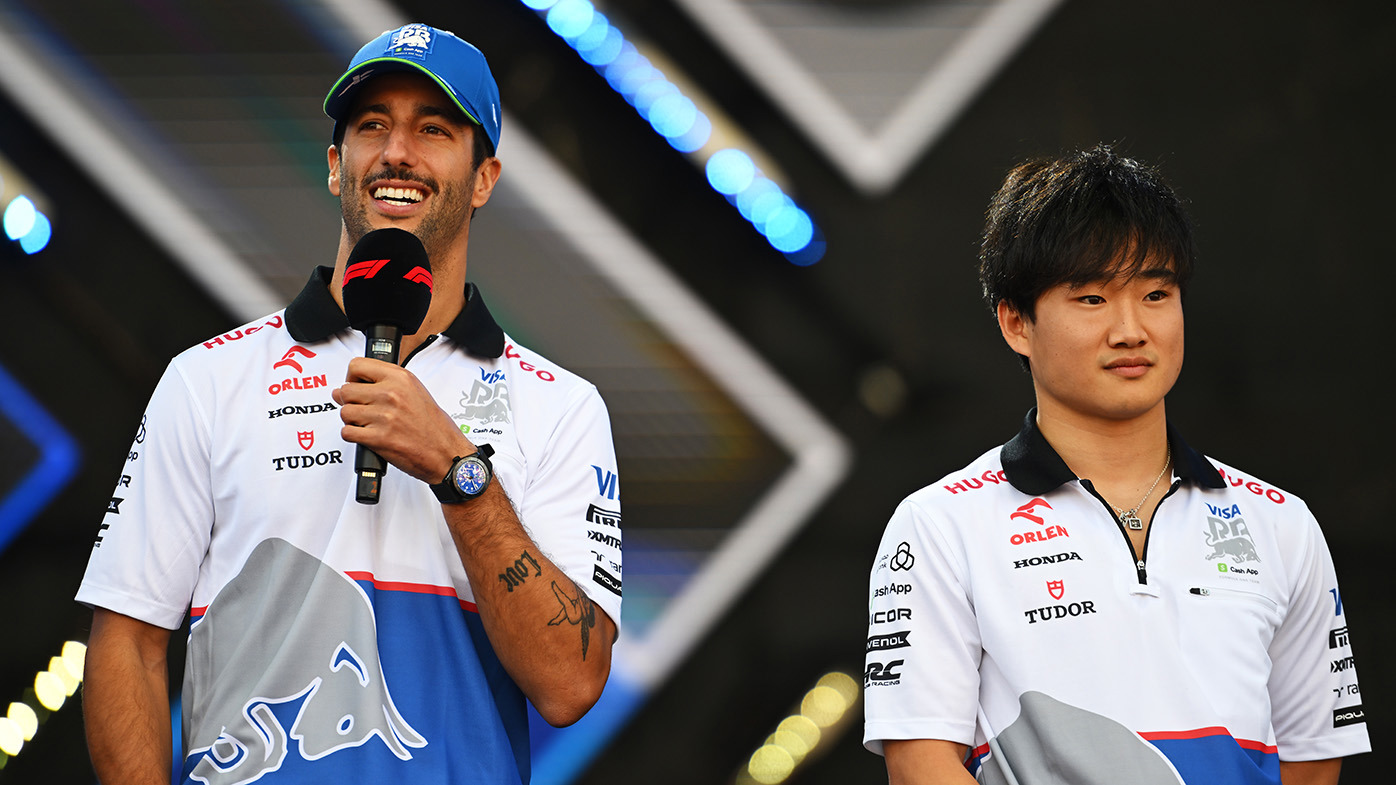 Daniel Ricciardo of Australia and Visa Cash App RB and Yuki Tsunoda of Japan and Visa Cash App RB talk to the crowd on the fan stage prior to practice ahead of the F1 Grand Prix of Bahrain at Bahrain International Circuit on February 29, 2024 in Bahrain, Bahrain. (Photo by Rudy Carezzevoli/Getty Images)