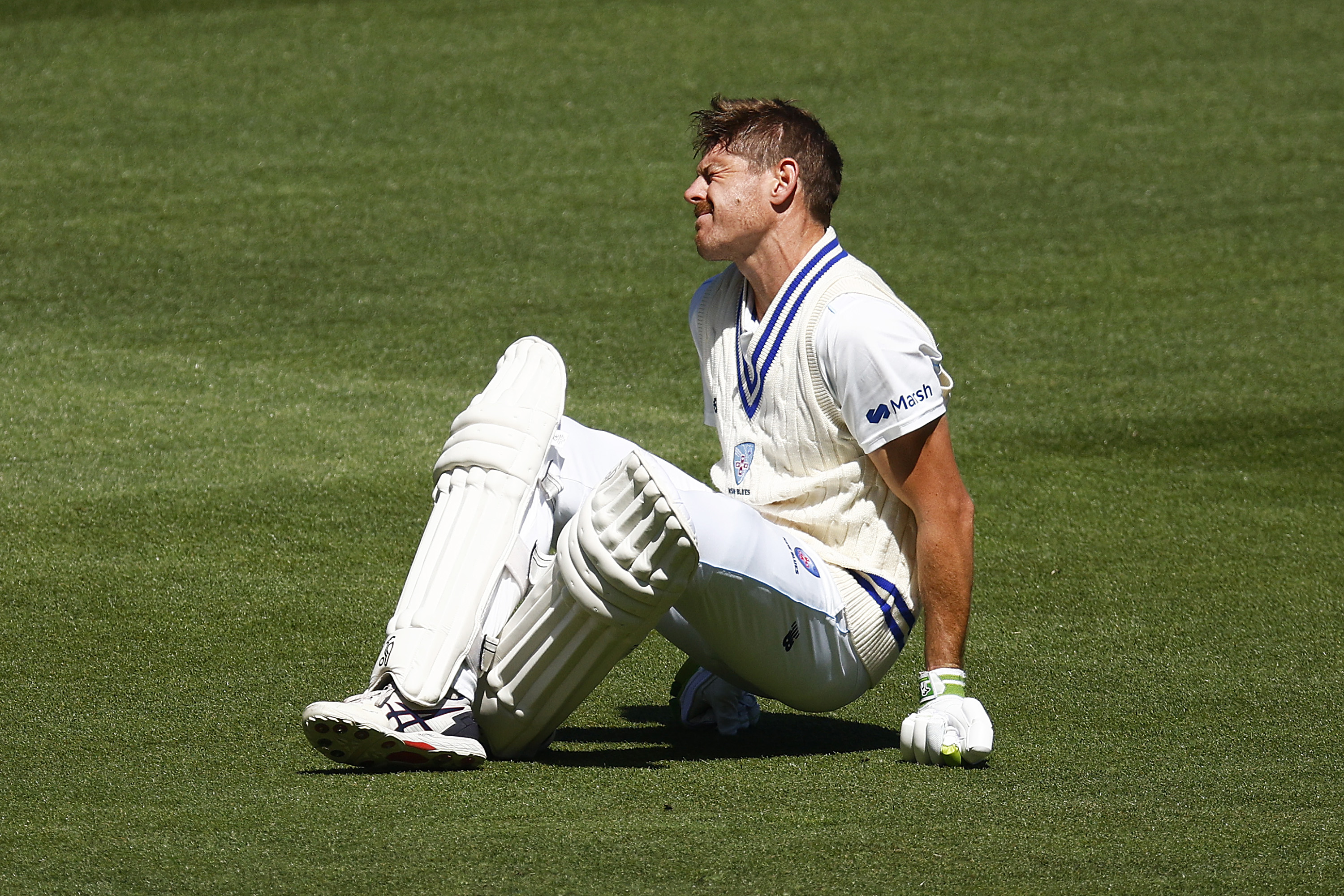 Daniel Hughes of New South Wales reacts after being struck in the foot by the ball by James Pattinson of Victoria.