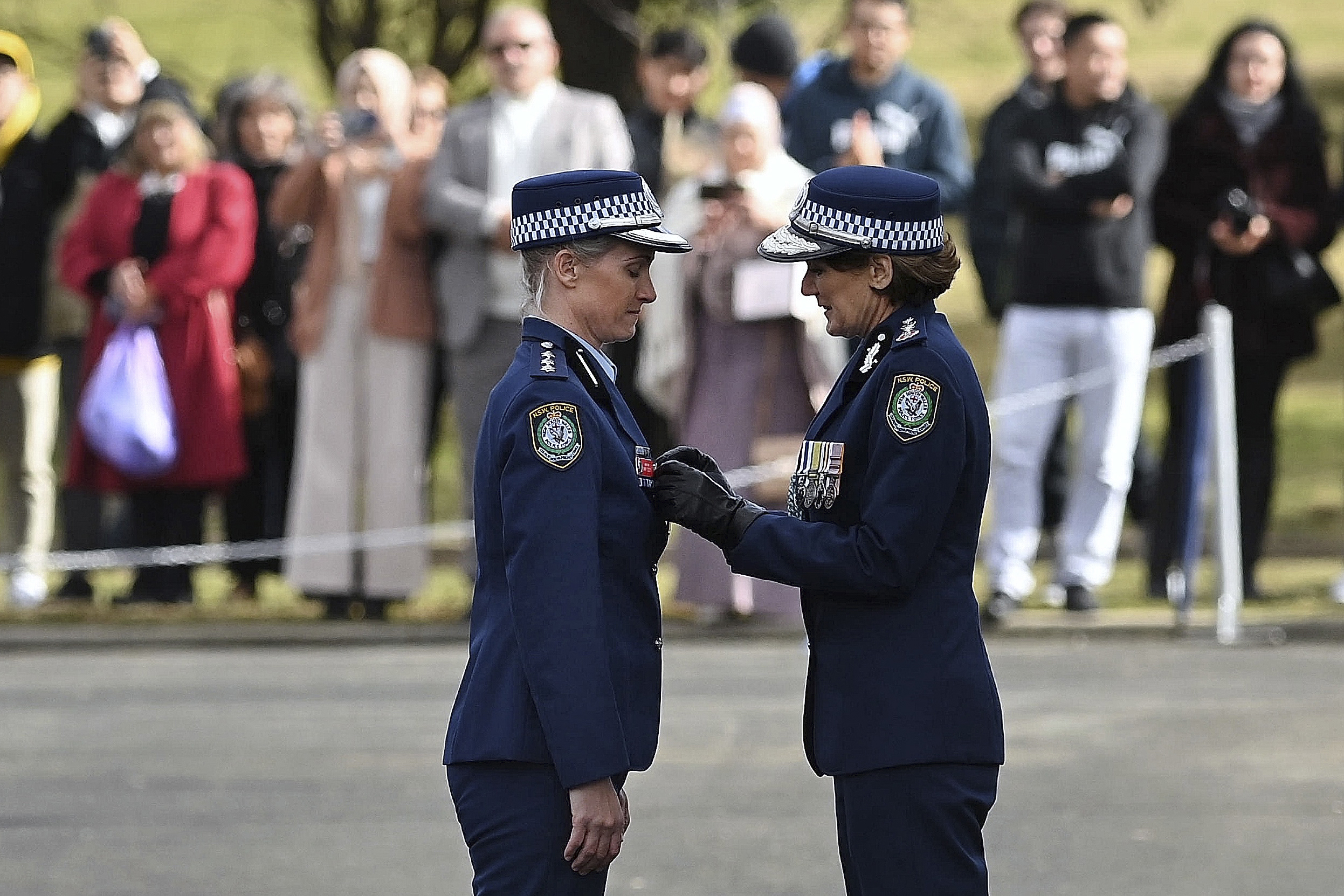 Inspector Amy Scott receives the Commissioners Valour Award during a ceremony at the NSW Police Academy in Goulburn