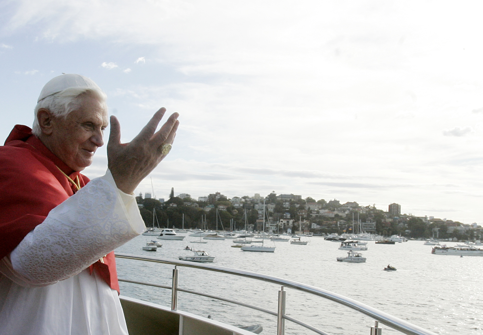 Pope Benedict XVI greets pilgrims aboard of the Sydney 2000 vessel in Sydney, Australia, on July 17, 2008.