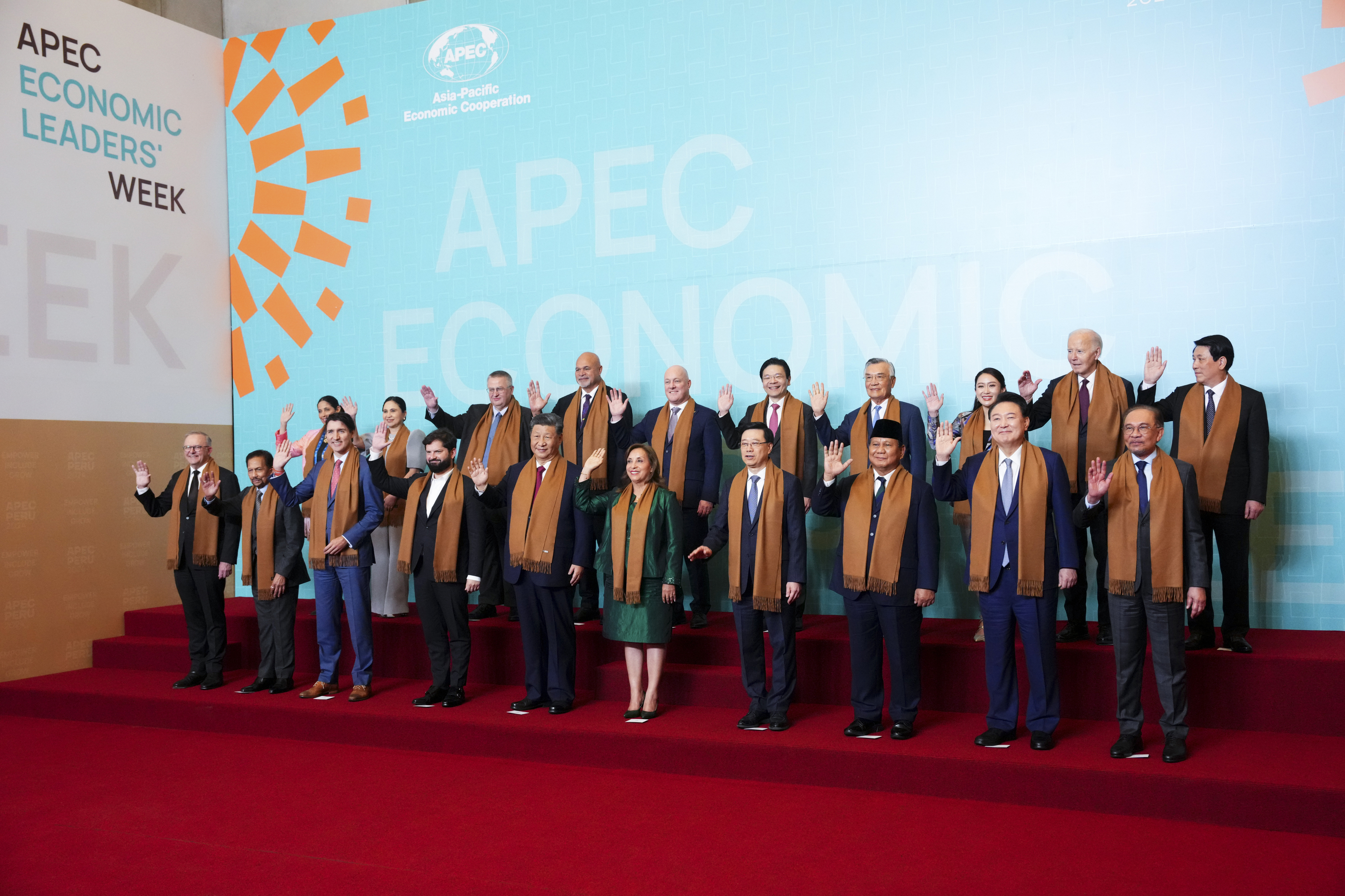 Prime Minister Justin Trudeau, third from front left, takes part a family photo during the APEC summit in Lima, Peru on Saturday, Nov. 16, 2024. (Sean Kilpatrick/The Canadian Press via AP)
