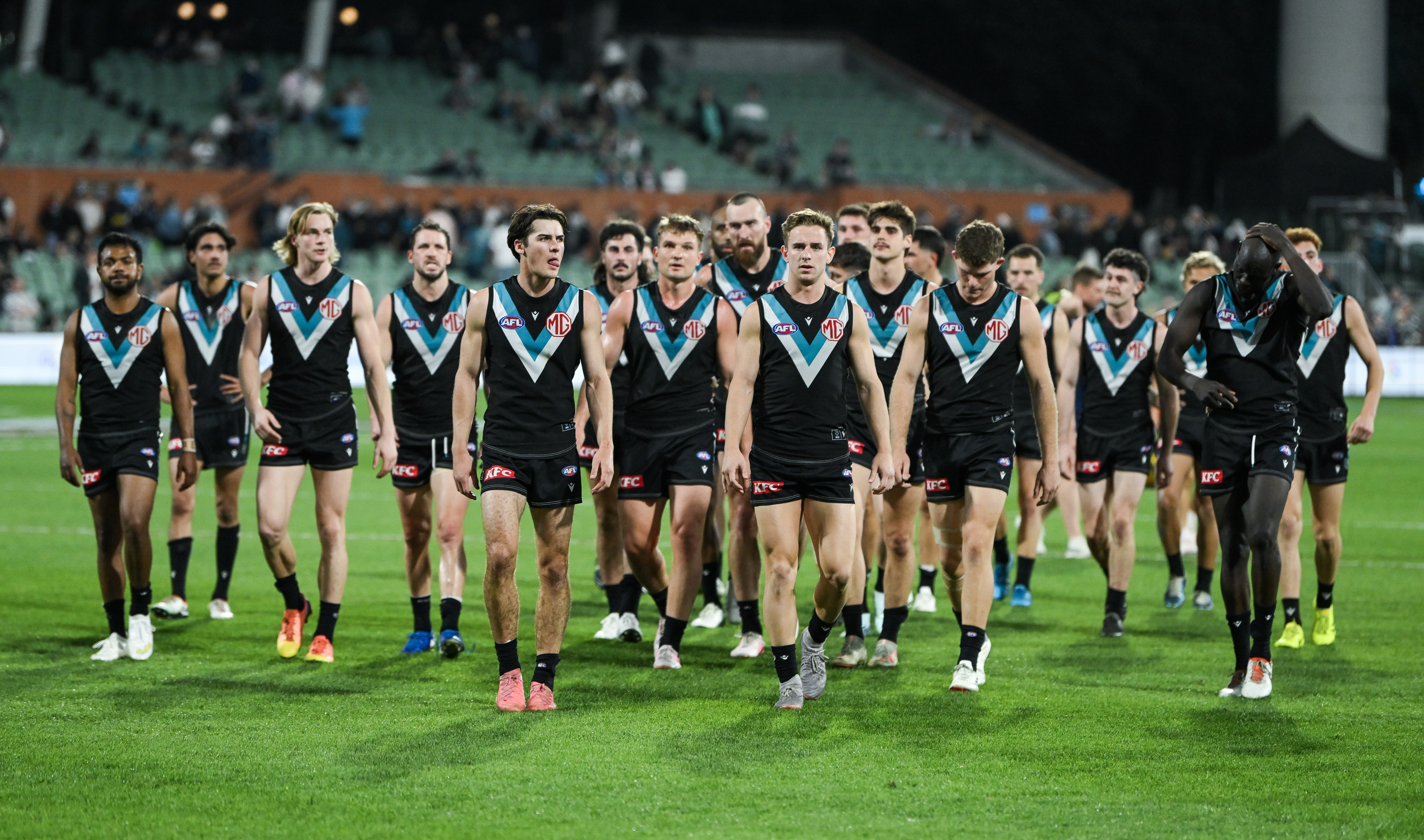 Port Adelaide leave the ground after losing  the AFL Second Qualifying Final to Geelong.