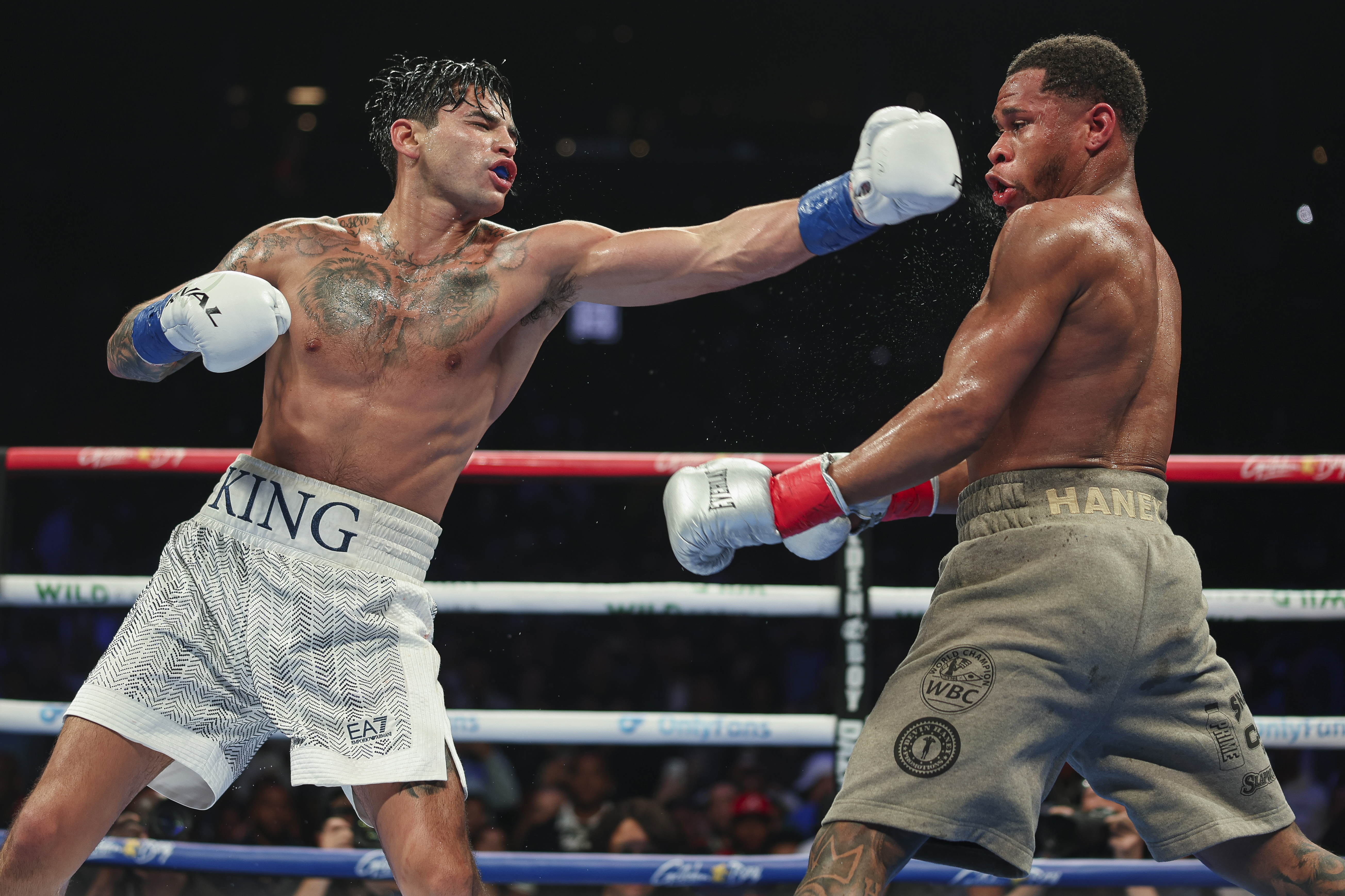 Ryan Garcia throws a punch at Devin Haney.