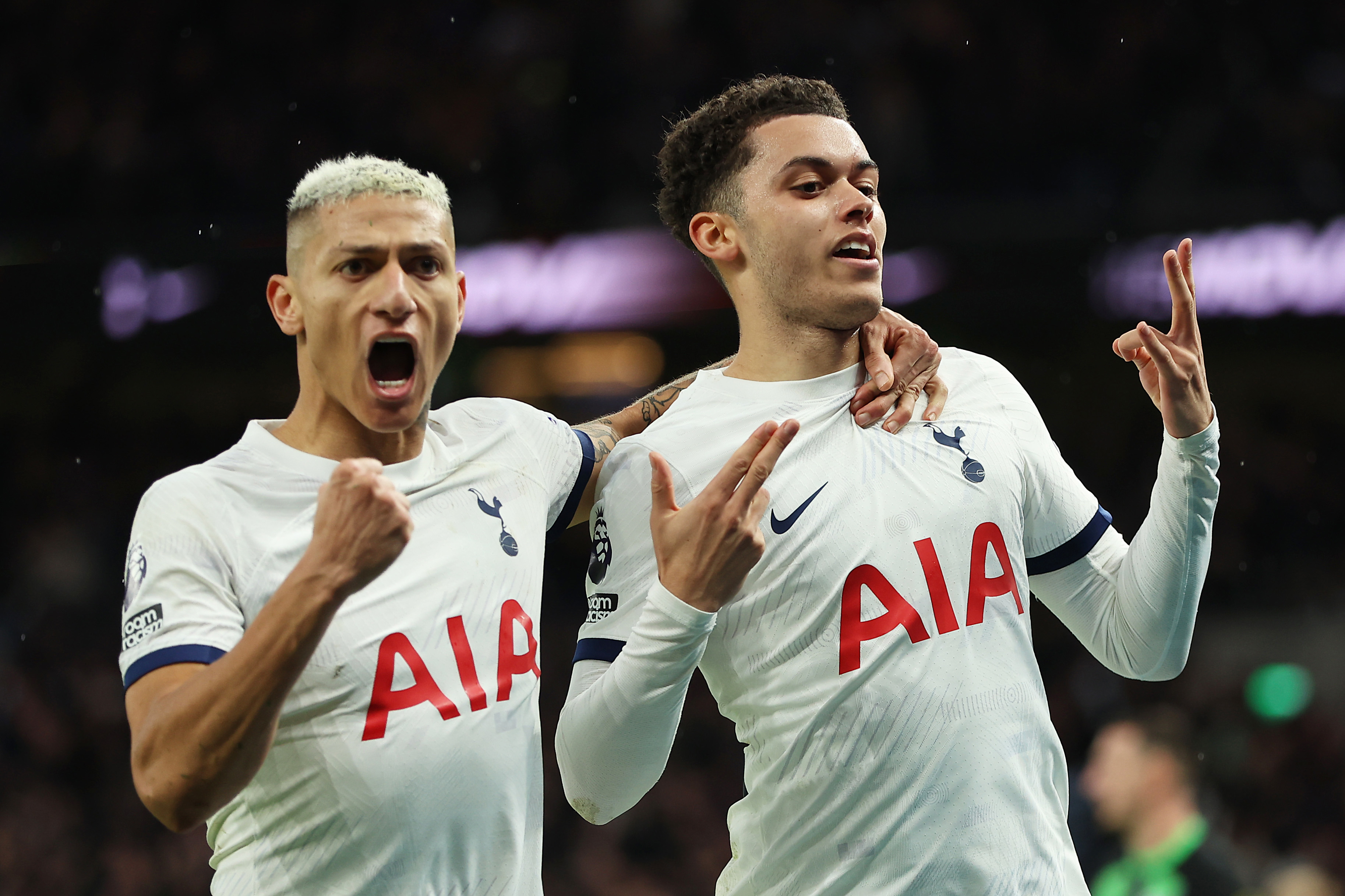 Brennan Johnson of Tottenham Hotspur celebrates with team mate Richarlison after scoring his team's second goal during the Premier League match between Tottenham Hotspur and Brighton & Hove Albion at Tottenham Hotspur Stadium on February 10, 2024 in London, England. (Photo by Richard Pelham/Getty Images)
