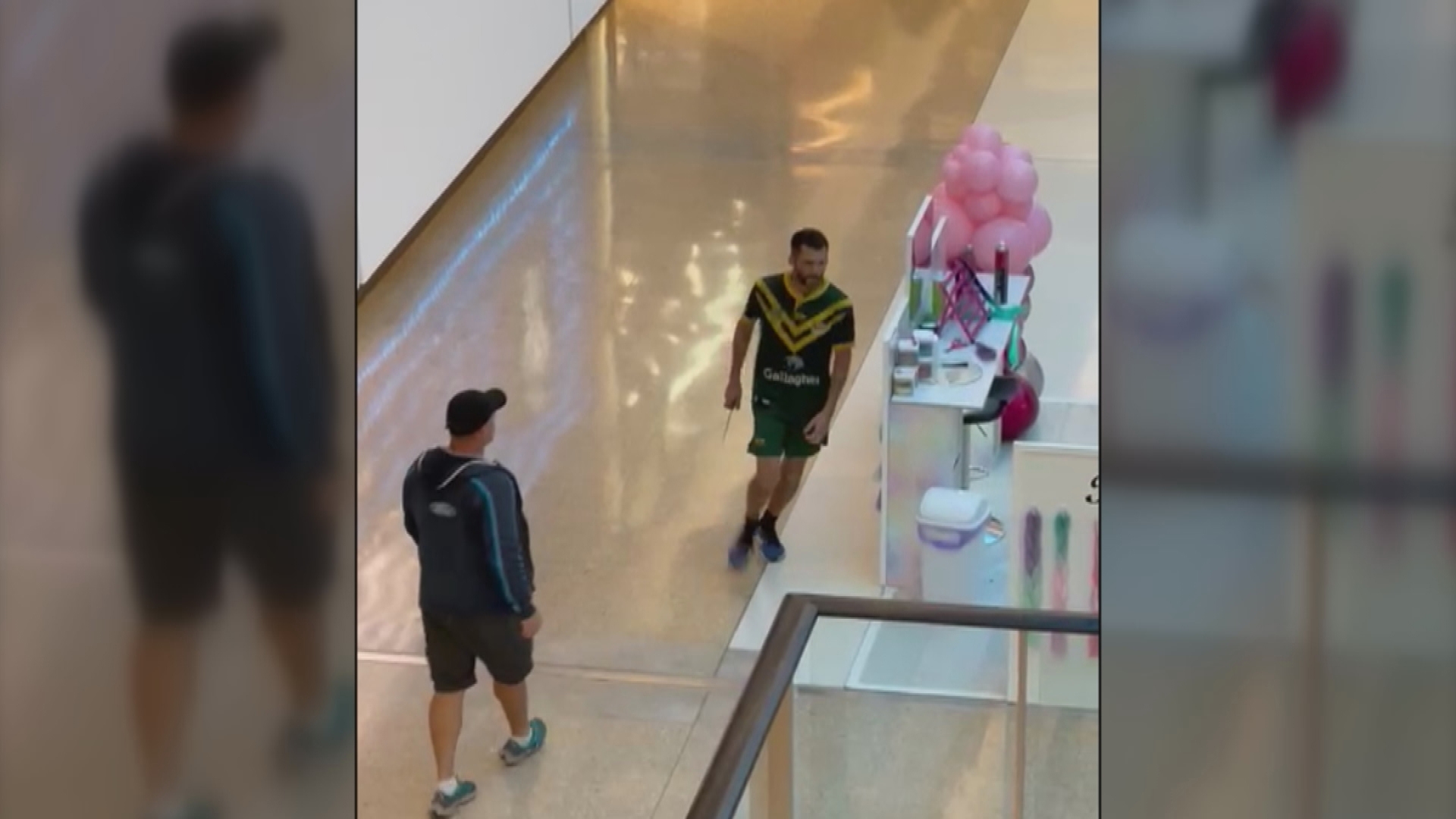 Video appeared to show a knife-wiedling man wearing a rugby league jersey.