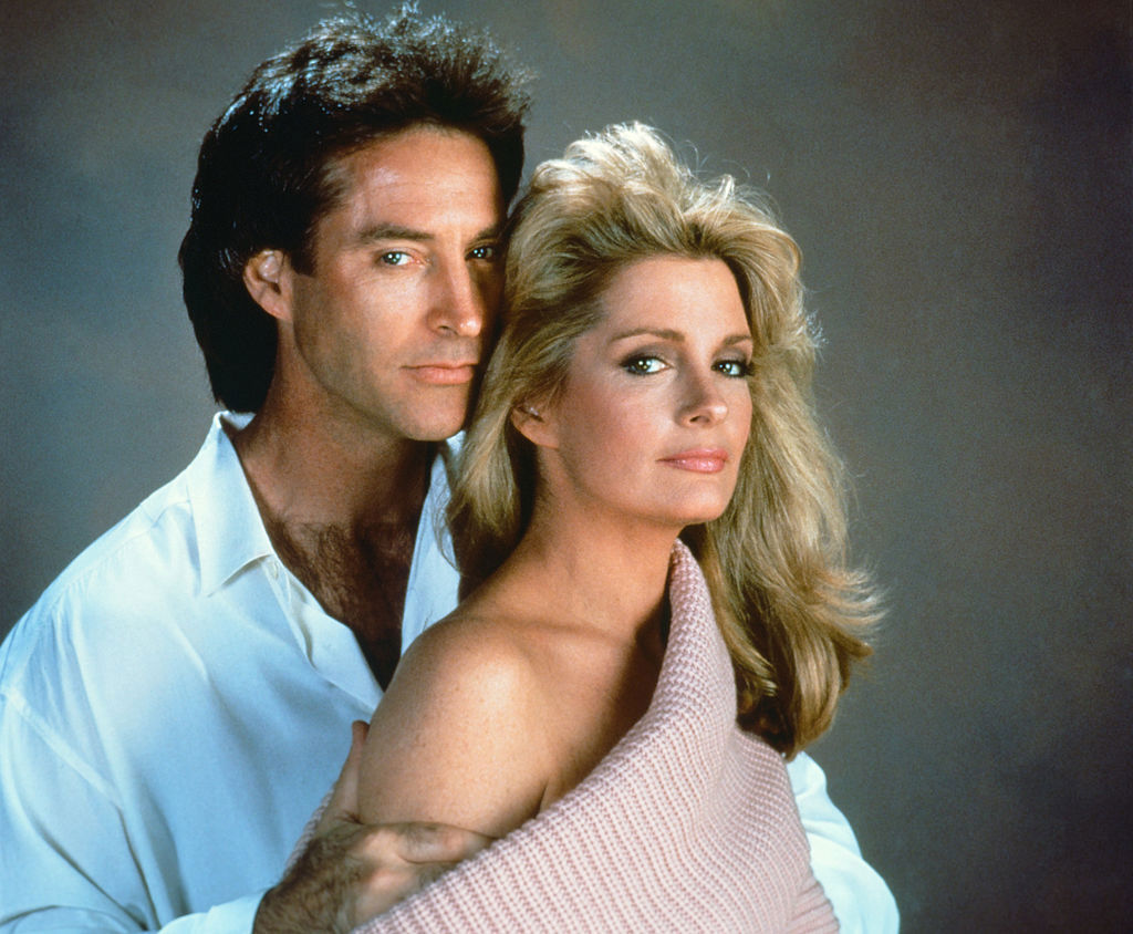 DAYS OF OUR LIVES -- Pictured: (l-r) Drake Hogestyn as John Black, Deidre Hall as Marlena Evans -- Photo by: NBC/NBCU Photo Bank