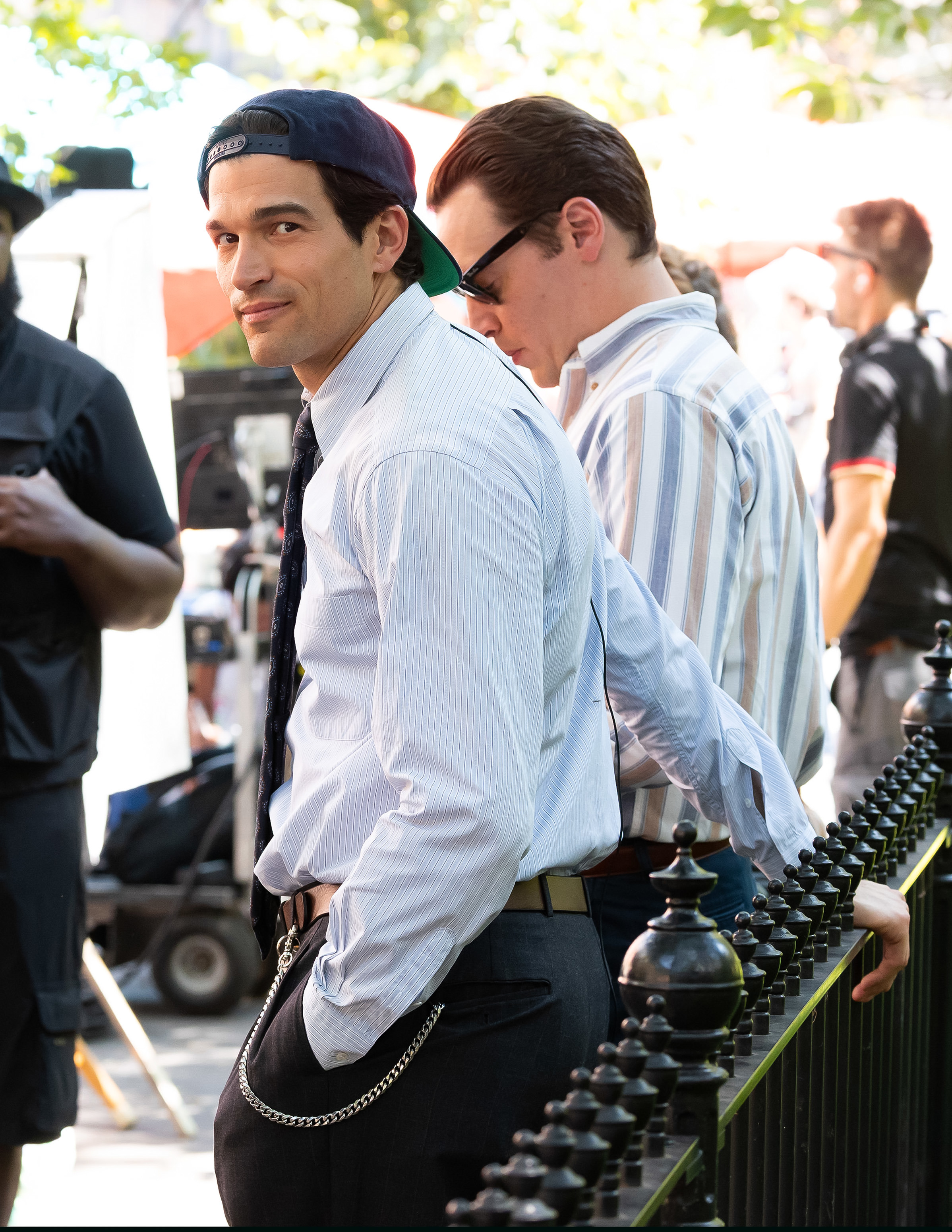 Paul Kelly and Erich Bergen are seen on the set of the series 