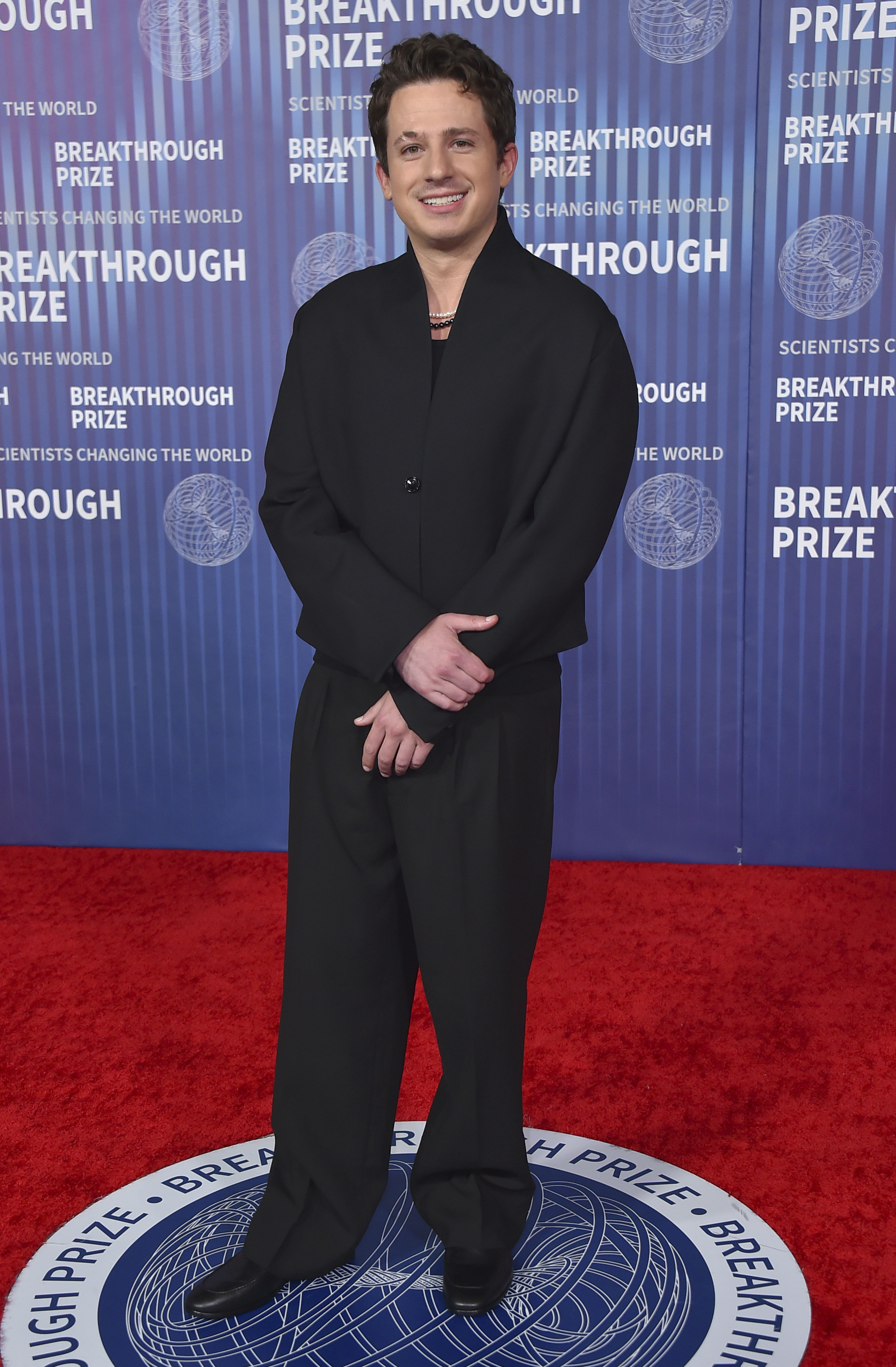 Charlie Puth arrives at the 10th Breakthrough Prize Ceremony on Saturday, April 13, 2024, at the Academy Museum of Motion Pictures in Los Angeles. 