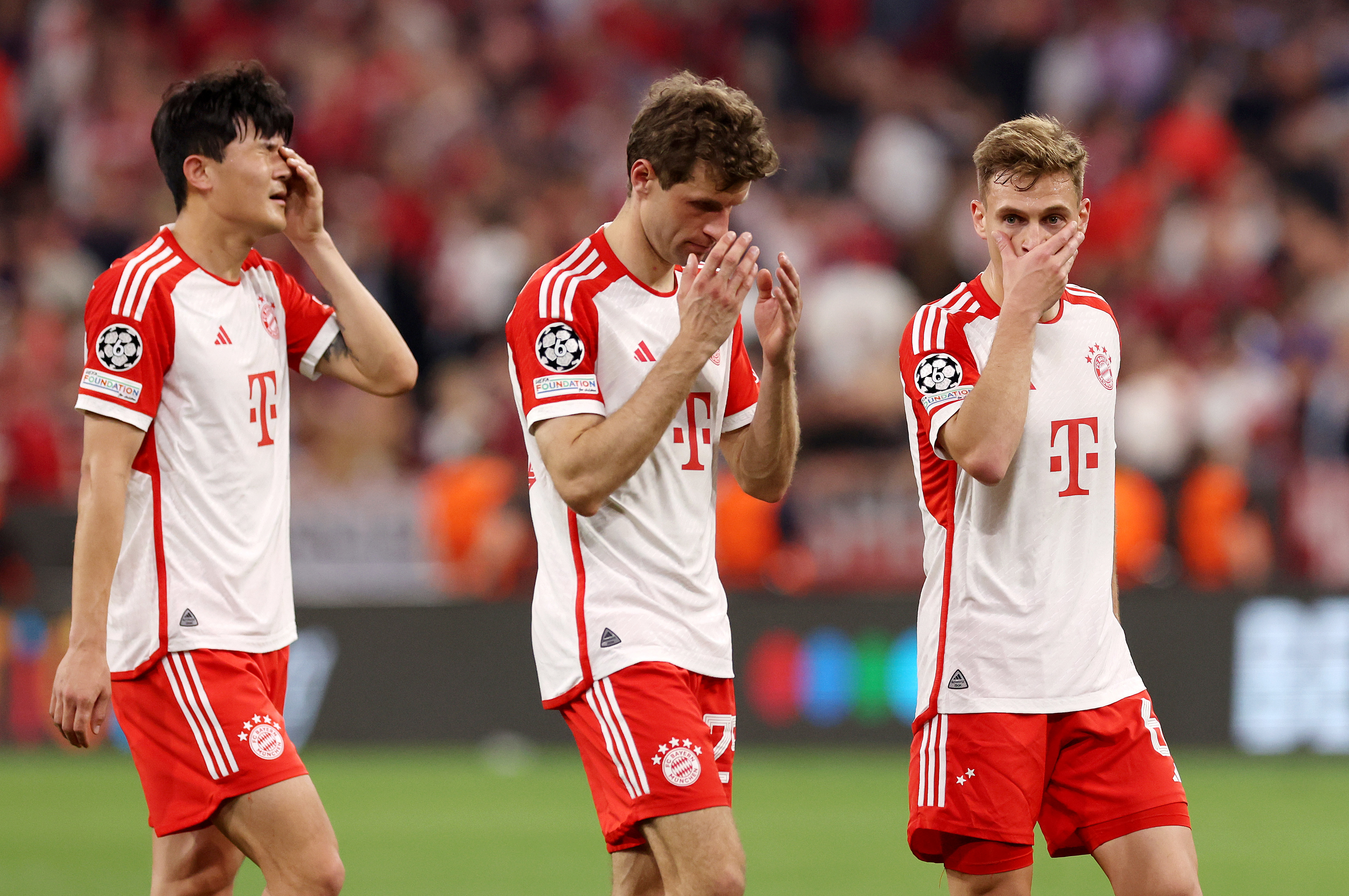 (From left) Kim Min-Jae, Thomas Mueller, and Joshua Kimmich of Bayern Munich react at full-time following the team's draw in the UEFA Champions League semi-final first leg match against Real Madrid.