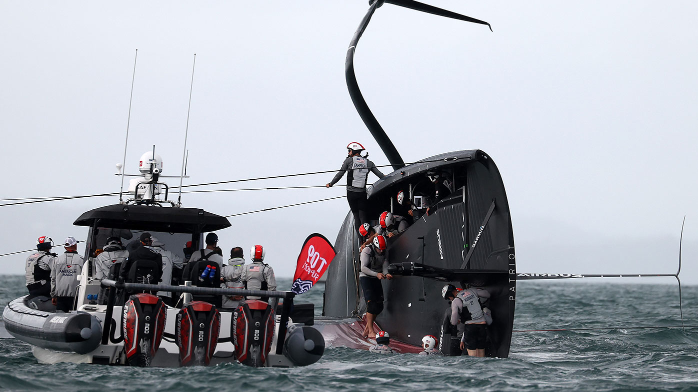  American Magic capsizes in race two against Prada Luna Rossa during the 2021 PRADA Cup Round Robins on Auckland Harbour on January 17, 2021 in Auckland,