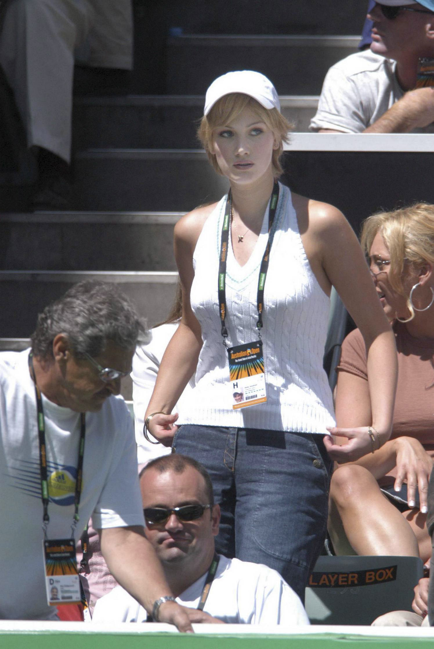Delta Goodrem watches the day six match between Mark  Philippoussis and Mario Ancic at the Australian Open, 24 January 2004.