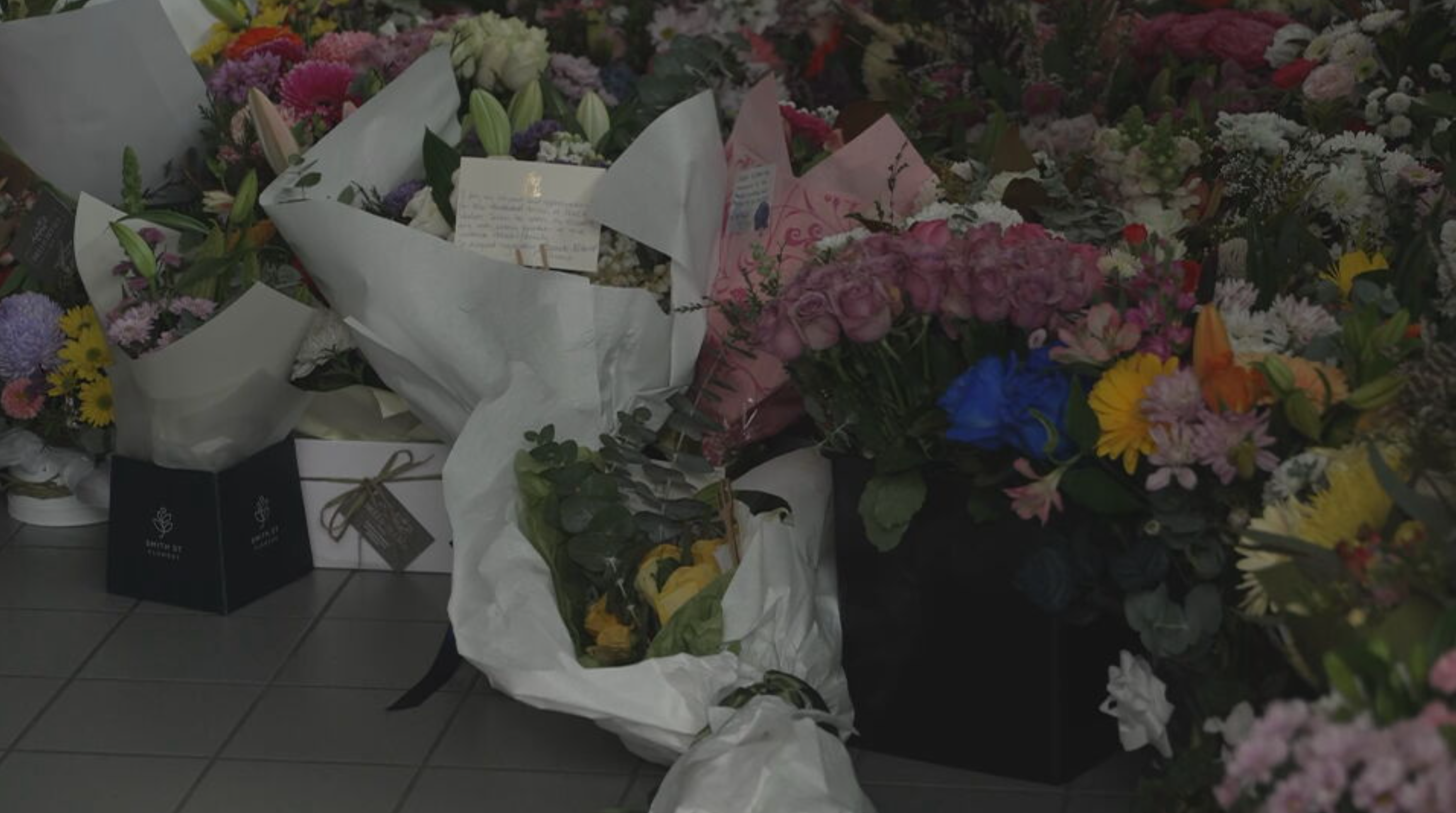 Premier Jacinta Allan and Police Minister Anthony Carbines lay floral arrangements in honour of the fallen officers.
