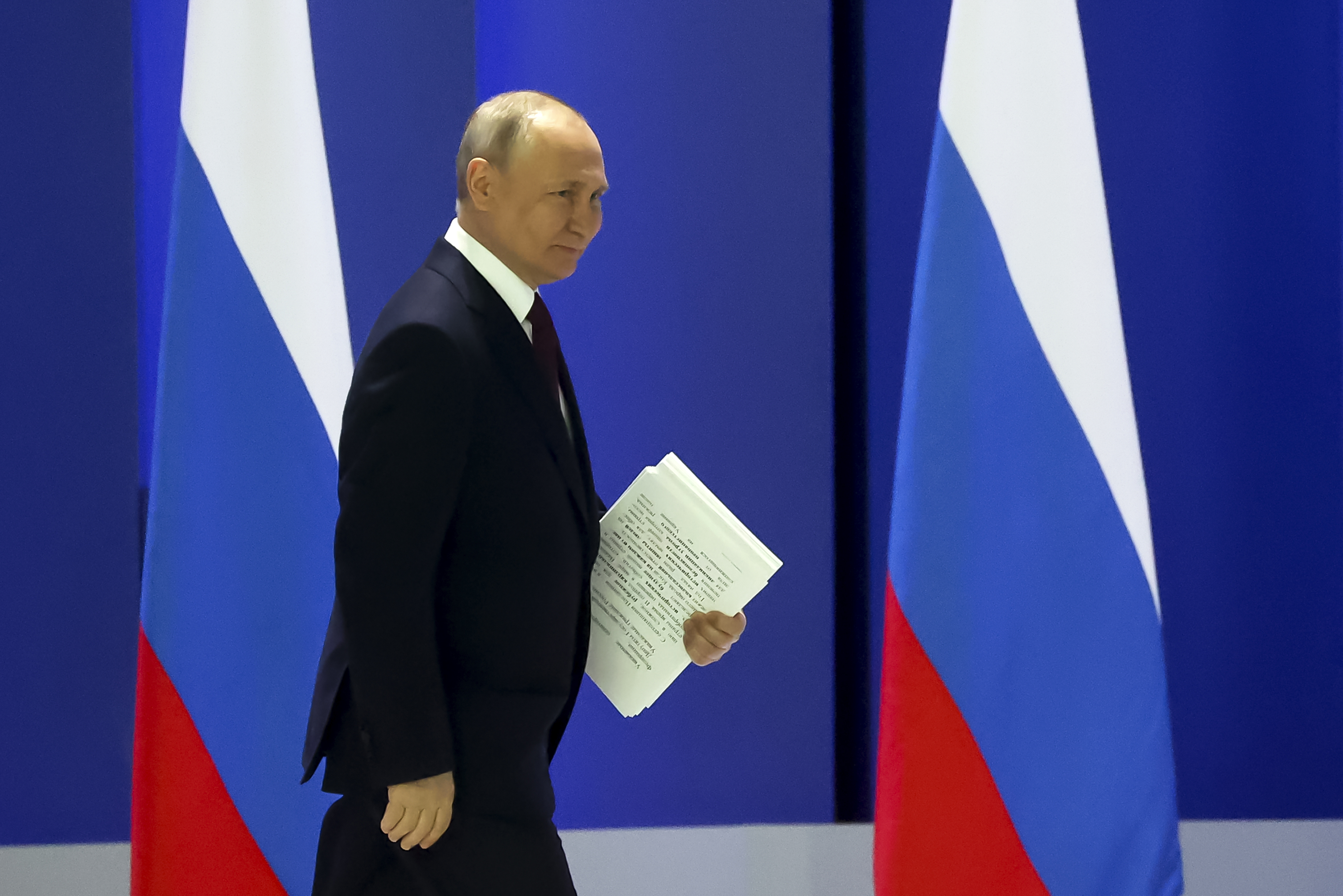 Russian President Vladimir Putin arrives to give his annual state of the nation address in Moscow, Russia, Tuesday, Feb. 21, 2023