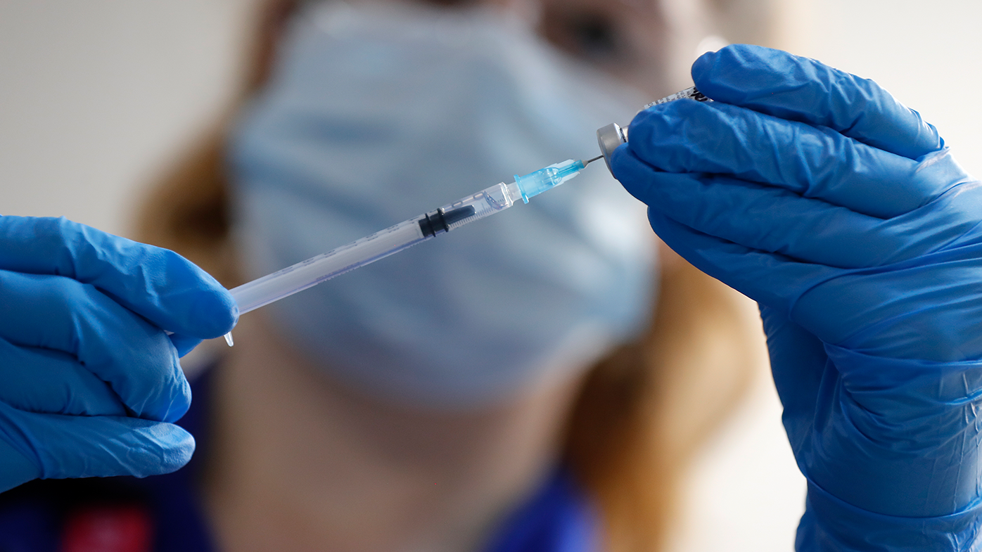 A nurse prepares to administer the Pfizer-BioNTech COVID-19 vaccine at Guys Hospital in London, Tuesday, Dec. 8, 2020. U.K. (AP Photo/Frank Augstein, Pool)