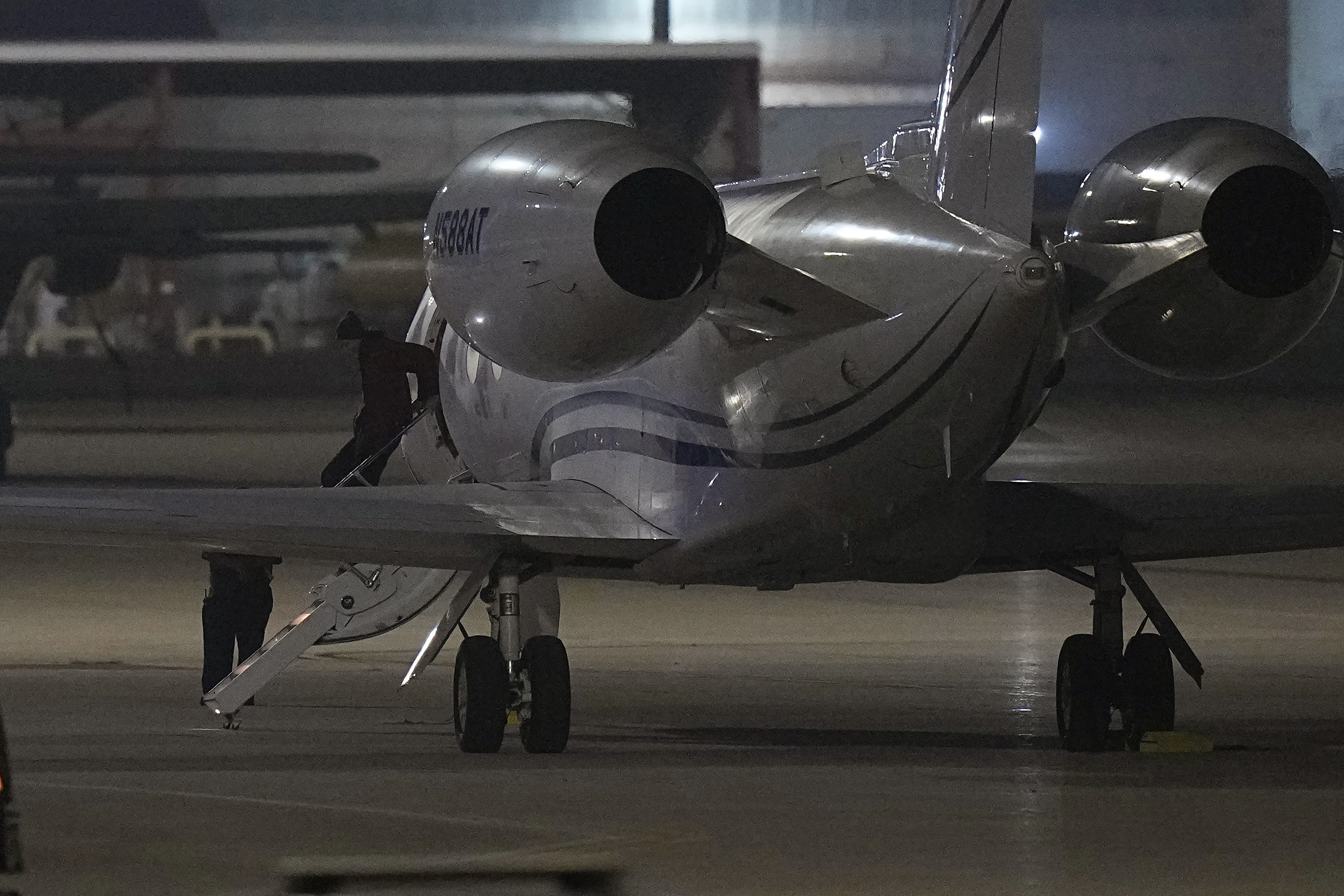 WNBA star Brittney Griner deplanes at Kelly Field in San Antonio, Texas, following her release in a prisoner swap with Russia, Friday, December 9, 2022