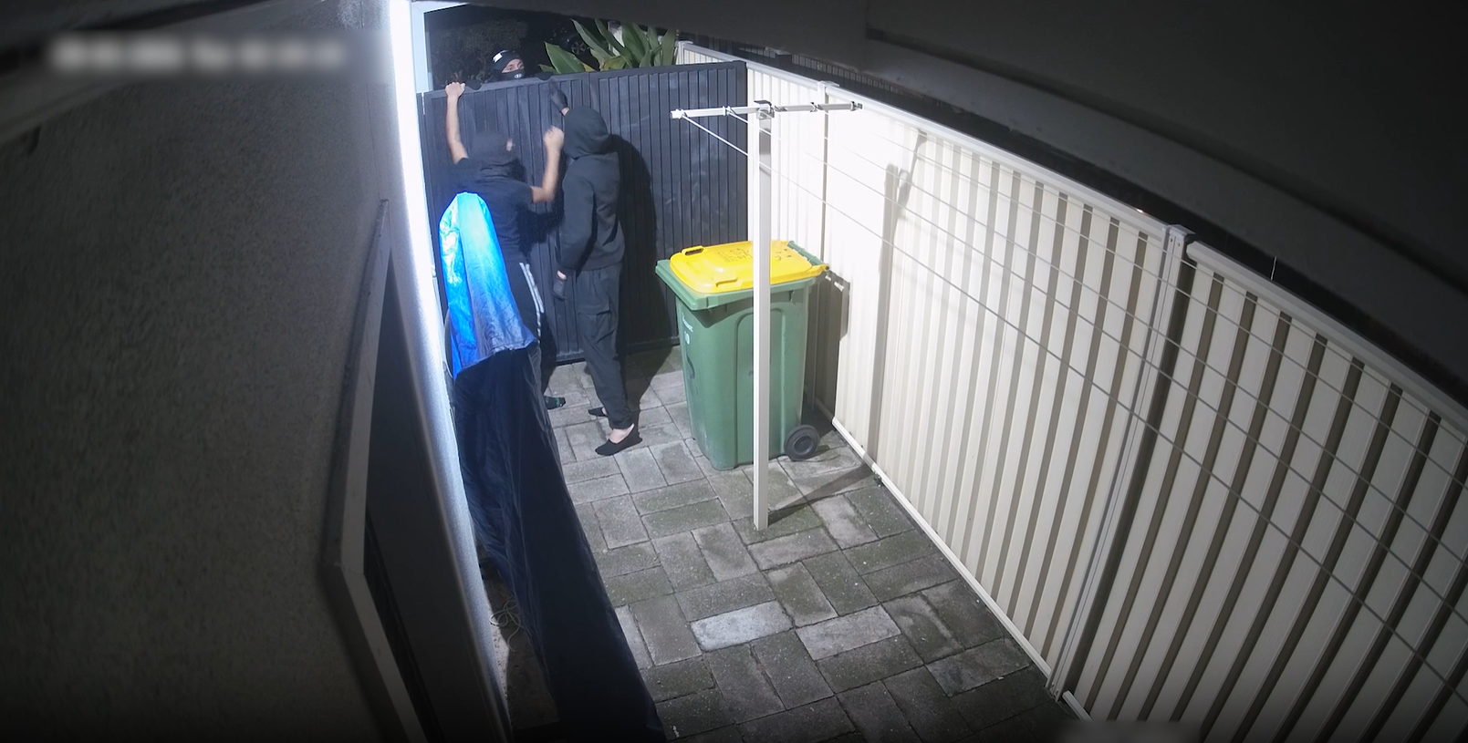 Police said four people wearing face coverings forced their way into a unit in Mermaid Waters at 1.30am today.