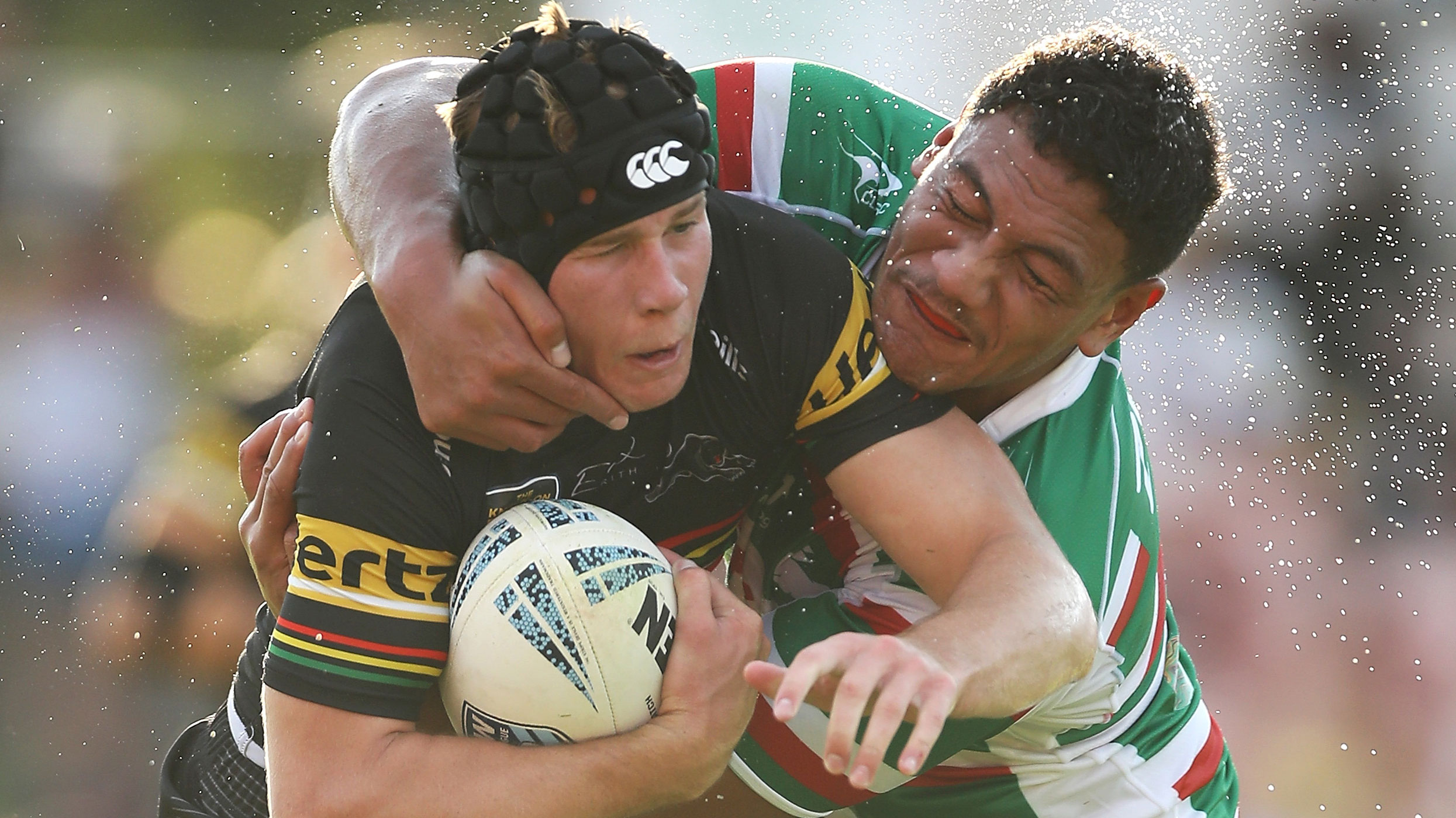 Matt Burton is tackled by a Souths player in NSW Cup.