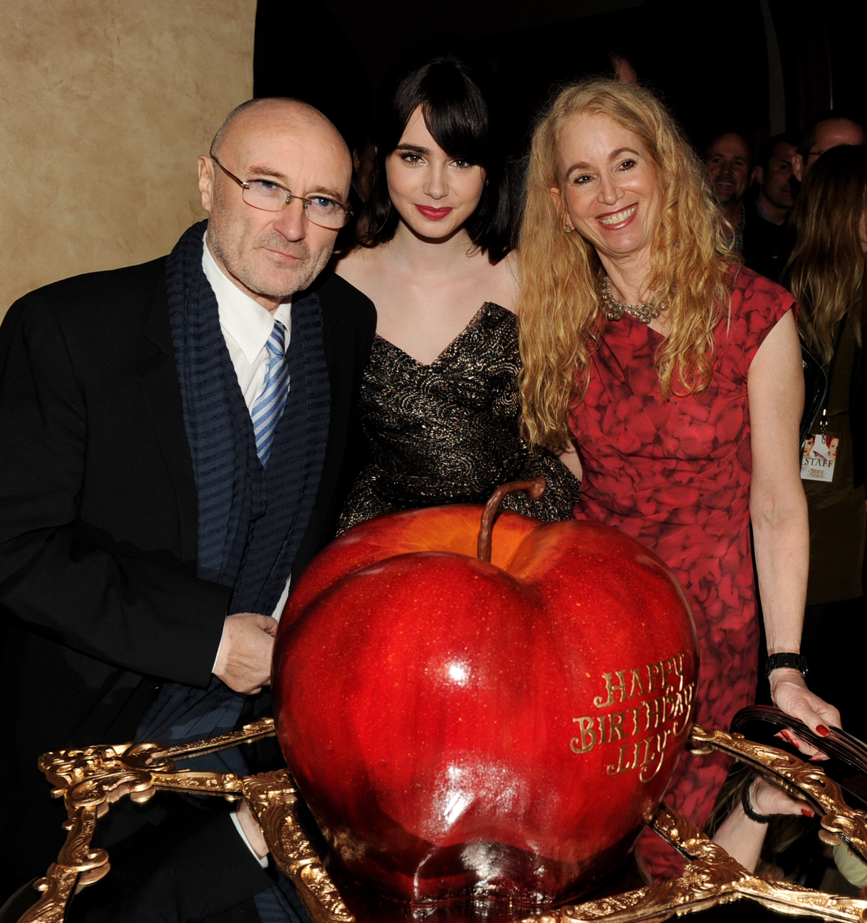 Musician Phil Collins, his daughter actress Lily Collins and her mom Jill Tavelman p at the premiere of Relativity Media's "Mirror Mirror" at the Chinese Theater on March 17, 2012 in Los Angeles, California.