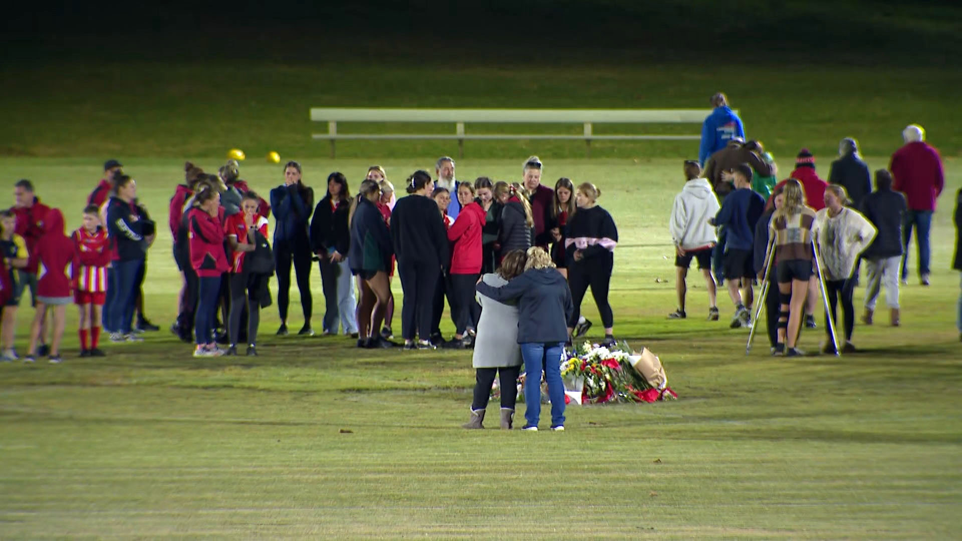 Community members gather at the Singleton Roosters football club following the horror Hunter Valley bus crash.